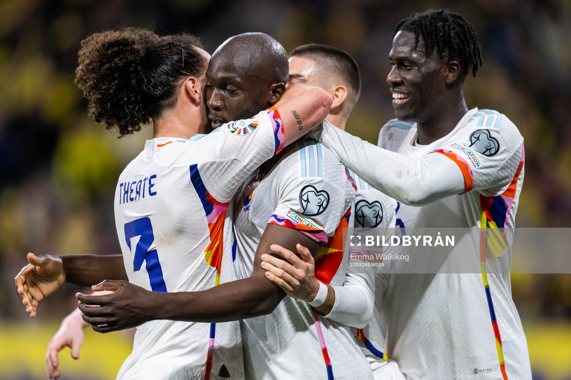 Romelu Lukaku of Belgium celebrates with Arthur Theate and
