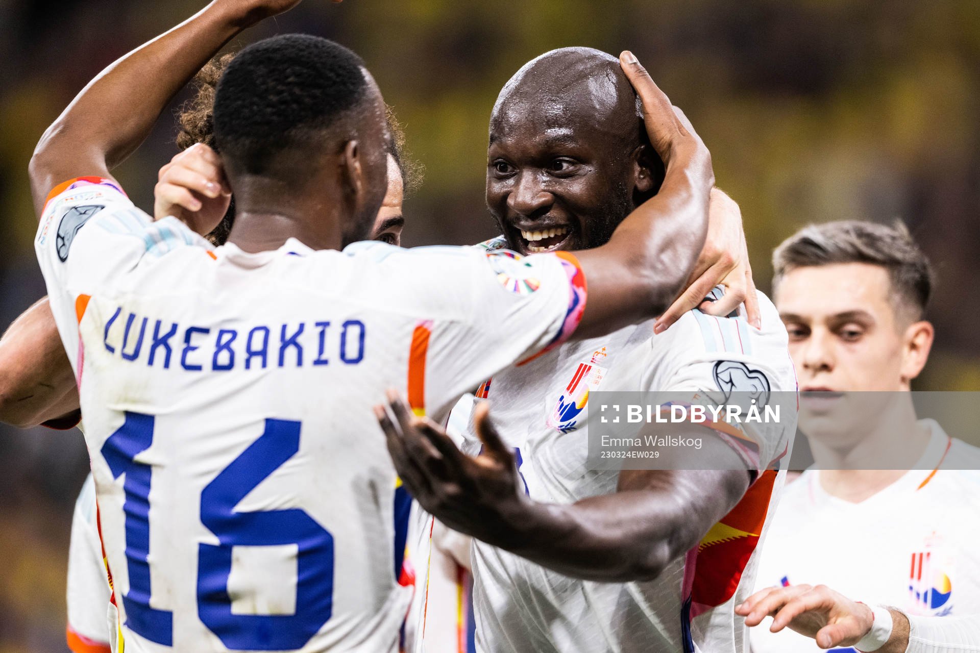 Romelu Lukaku of Belgium celebrates with Dodi Lukebakio