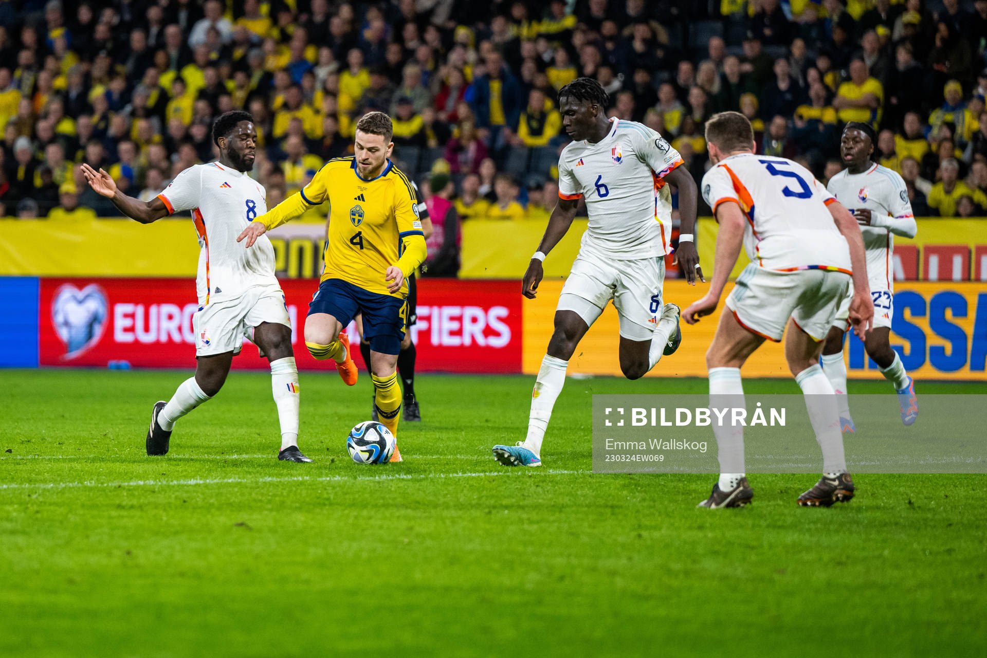 Orel Mangala and Amadou Onana of Belgium compete for the