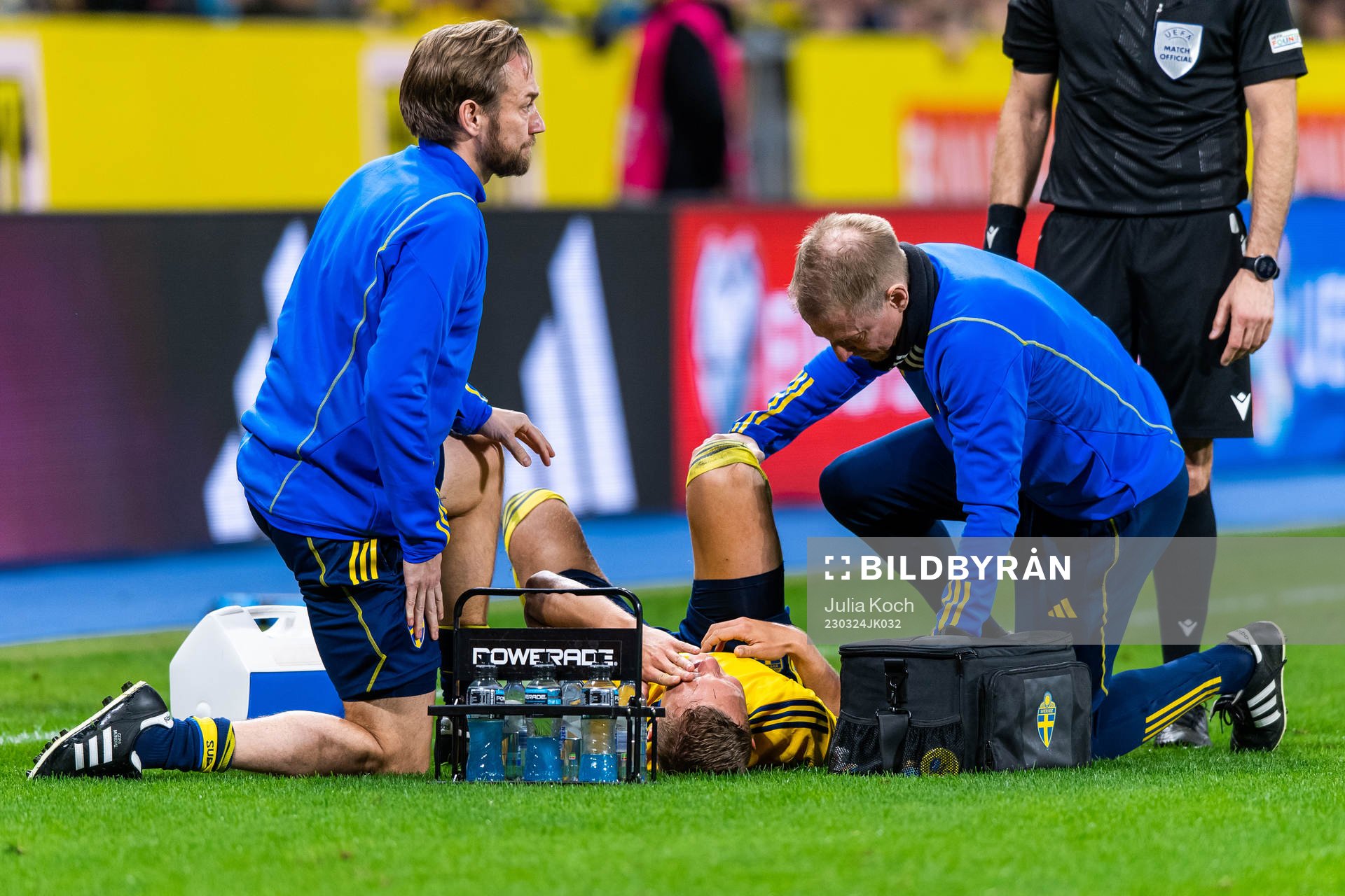 Ludvig Augustinsson of Sweden receives medical attention