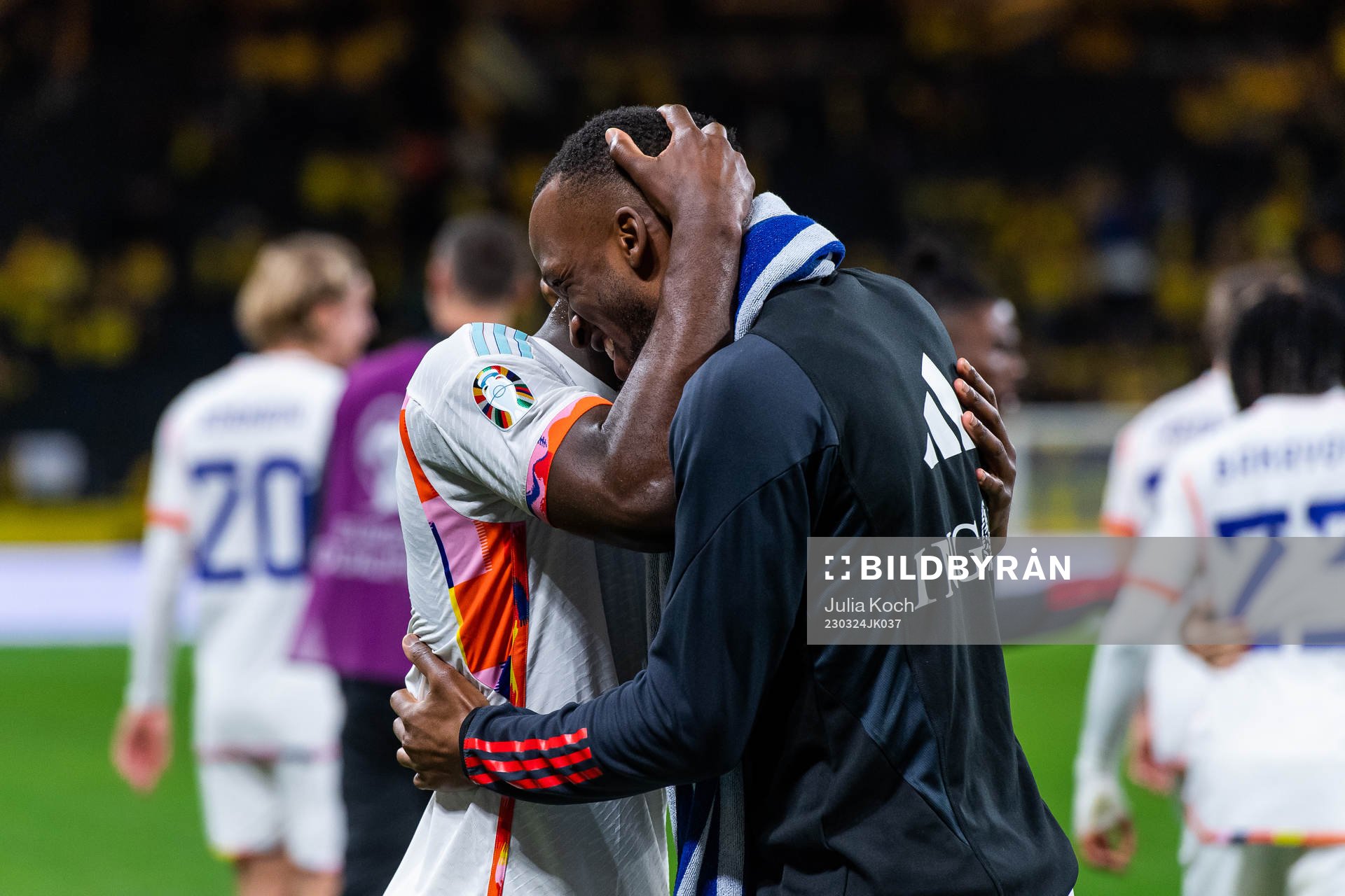 Orel Mangala and Dodi Lukebakio of Belgium celebrate