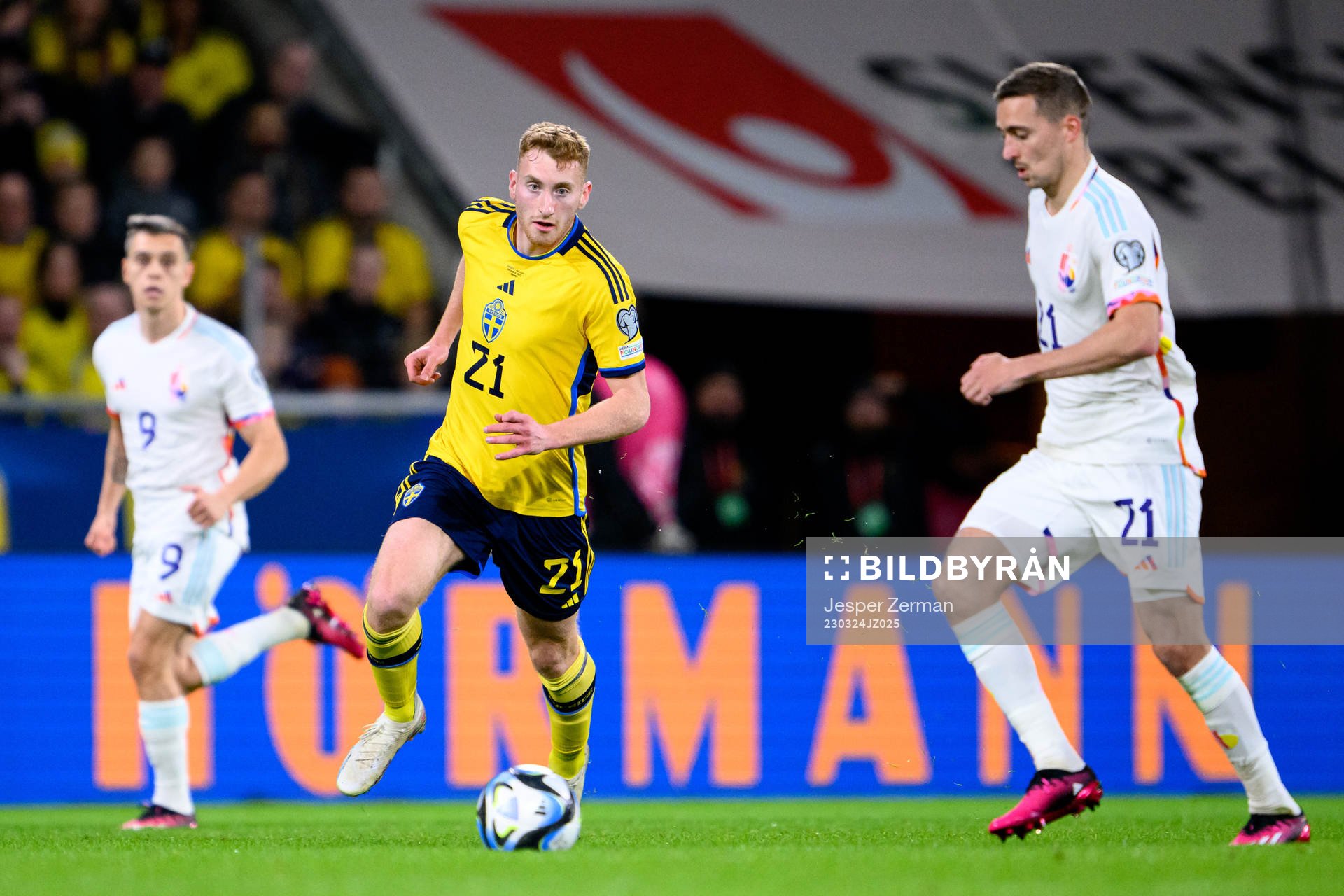 Dejan Kulusevski of Sweden and Timothy Castagne of Belgium