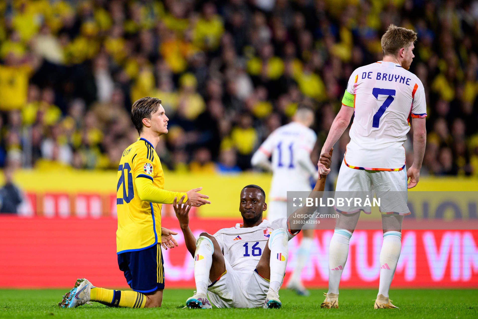 Kristoffer Olsson of Sweden and Dodi Lukebakio of Belgium