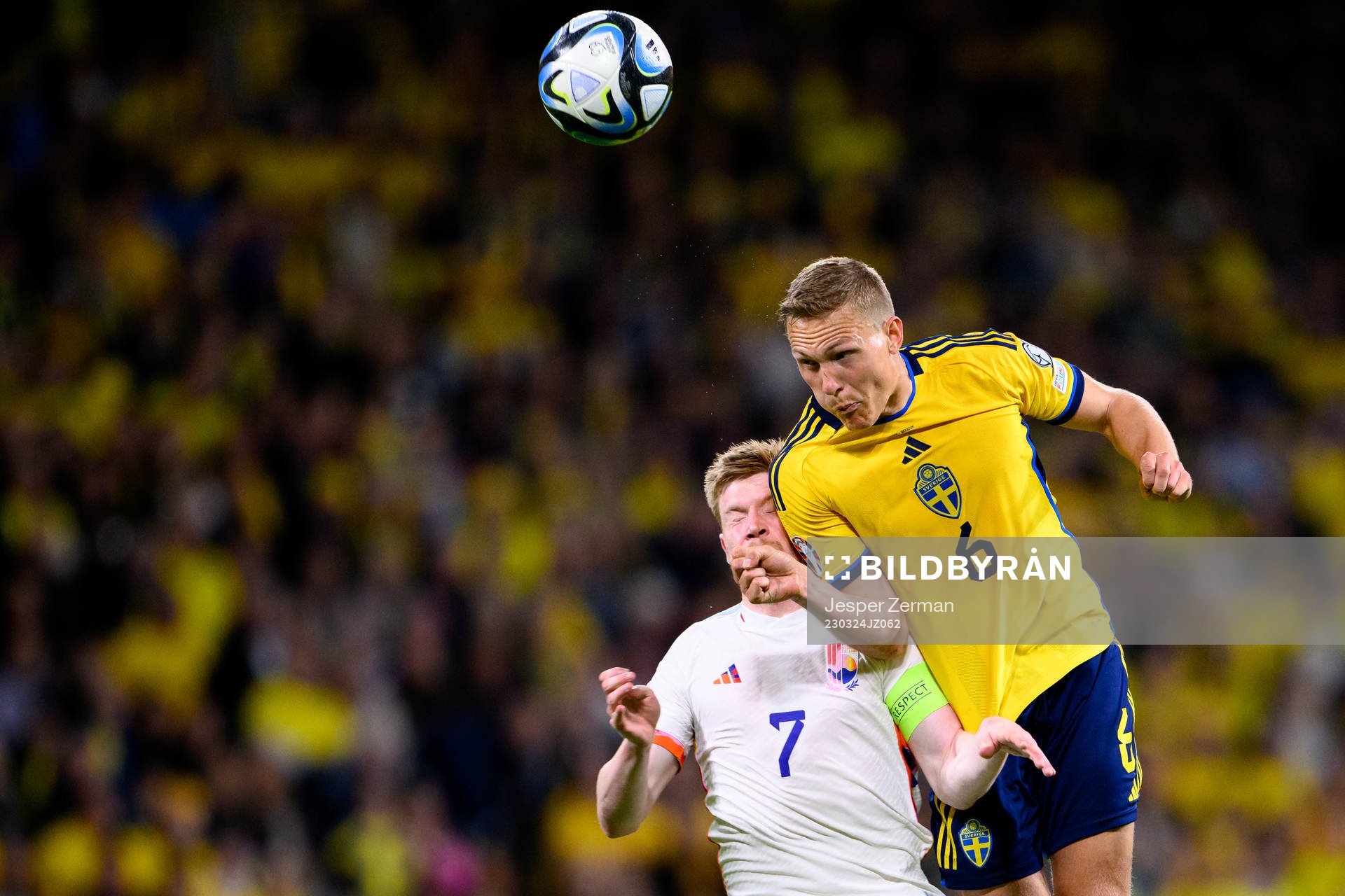 Kevin de Bruyne of Belgium and Ludvig Augustinsson of Sweden