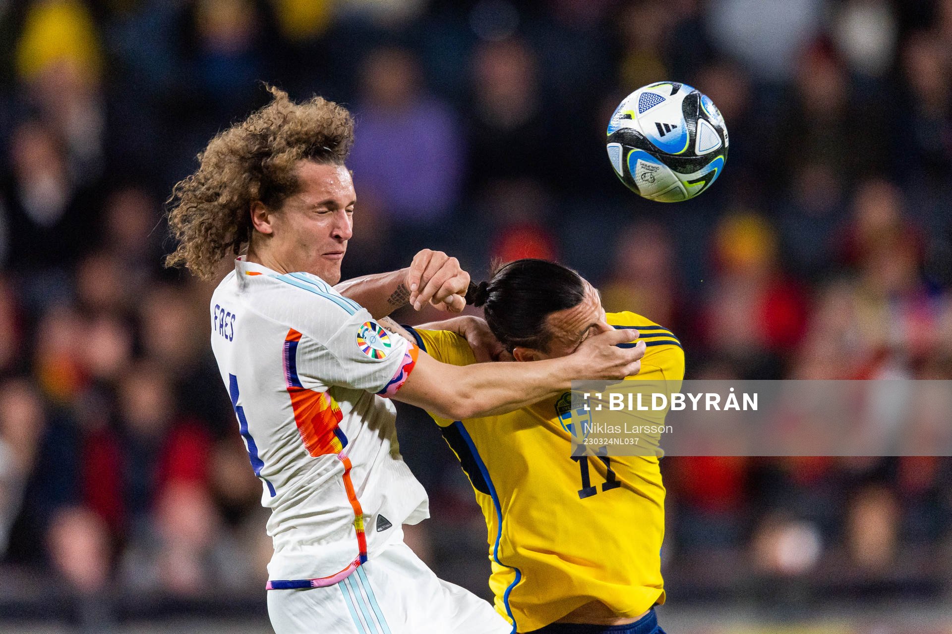 Amadou Onana of Belgium and Zlatan Ibrahimovic of Sweden