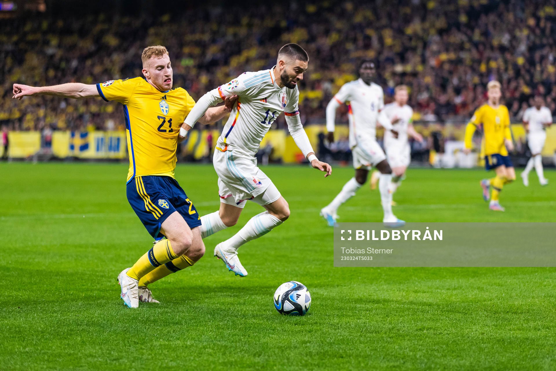 Dejan Kulusevski of Sweden and Yannick Carrasco of Belgium