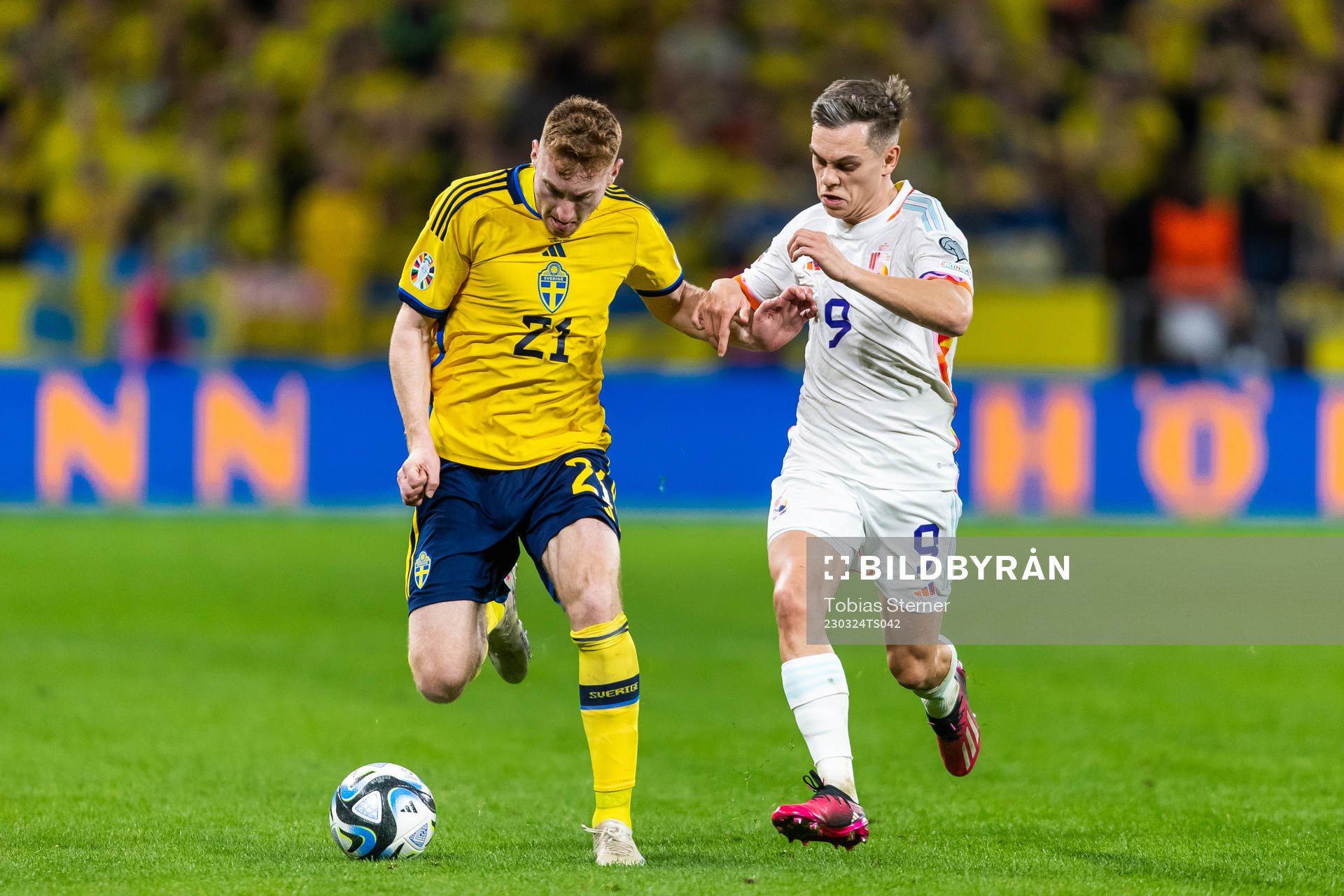 Dejan Kulusevski of Sweden and Leandro Trossard of Belgium