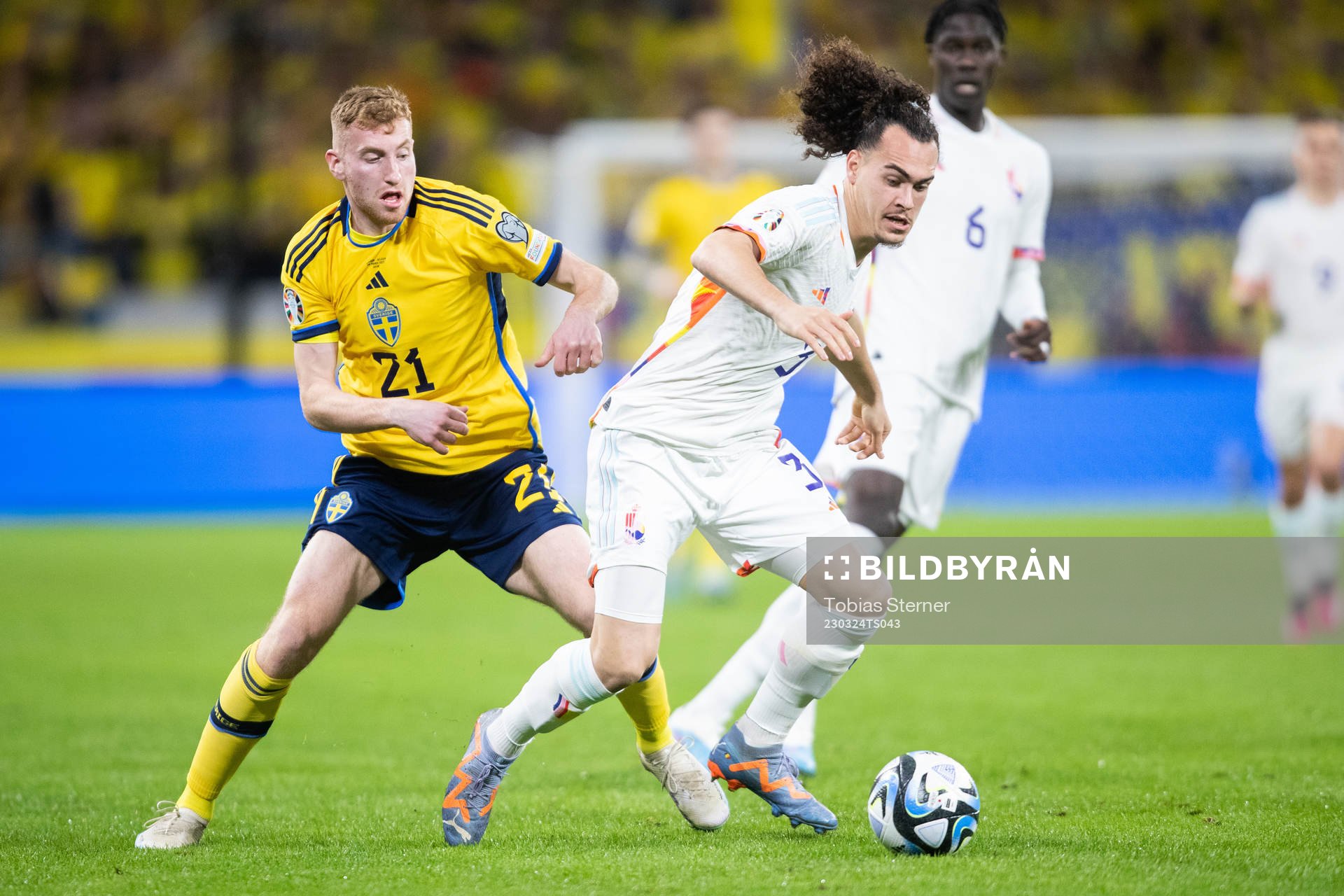 Dejan Kulusevski of Sweden and Arthur Theate of Belgium