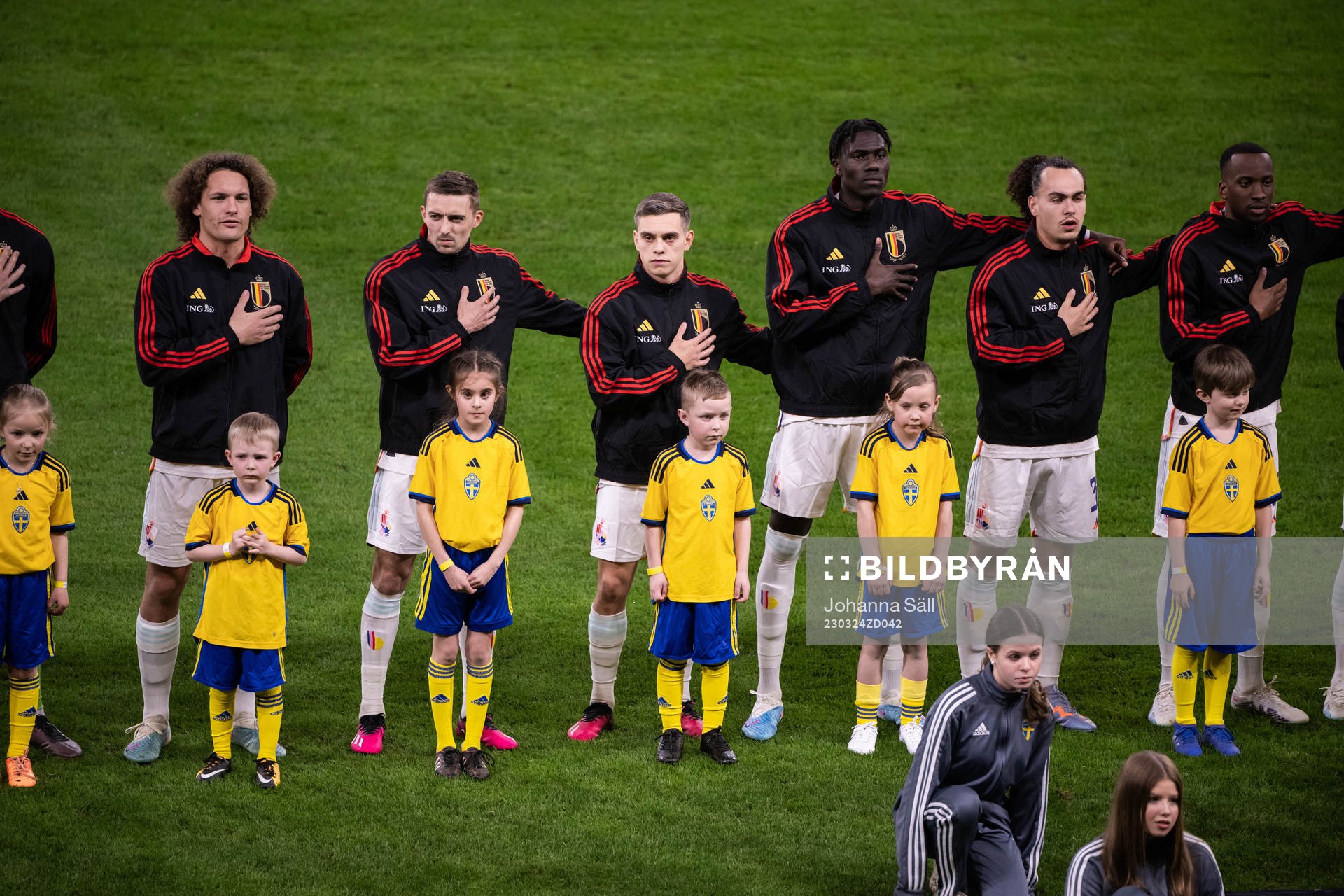 Players of Belgium with mascots