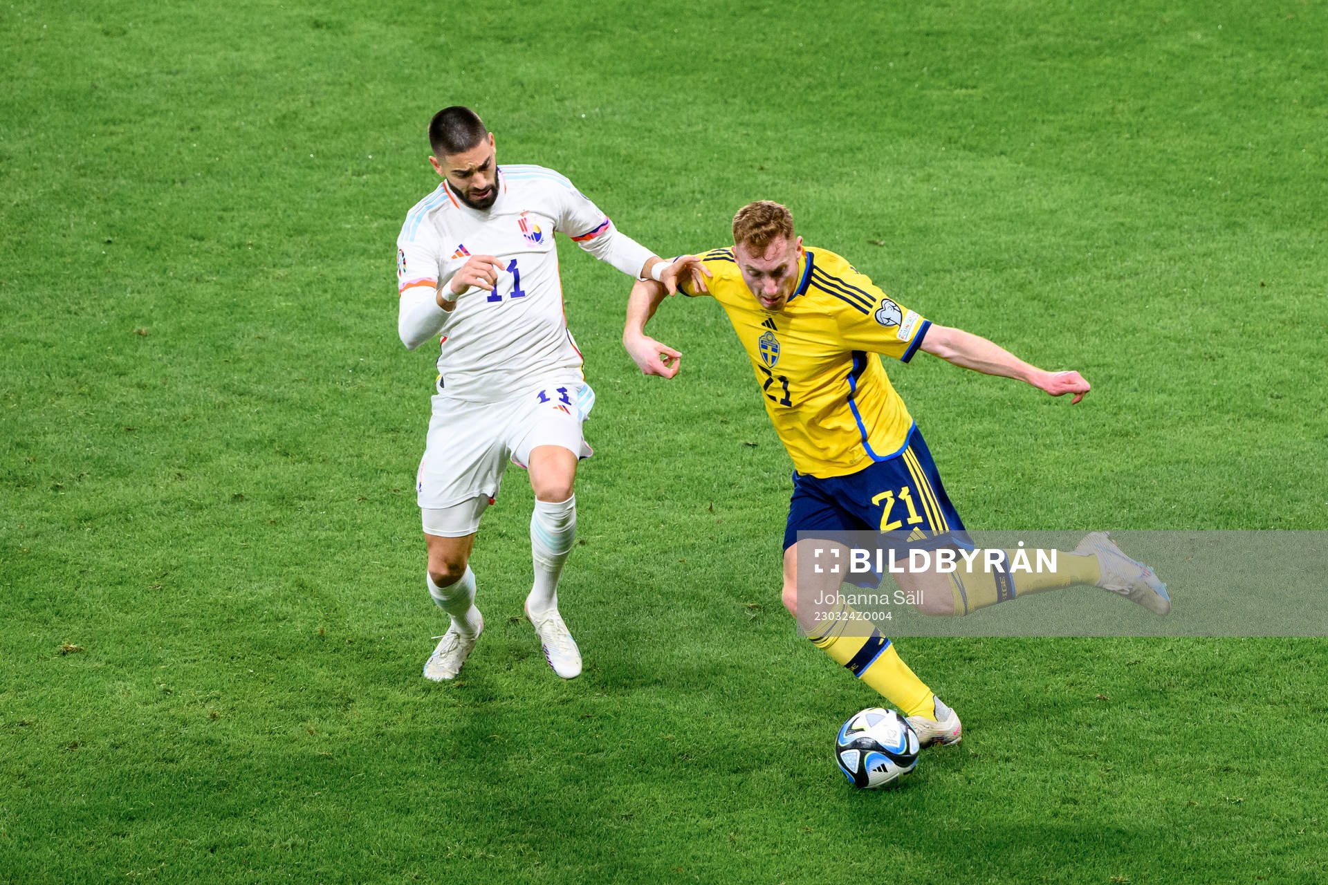 Yannick Carrasco of Belgium and Dejan Kulusevski of Sweden