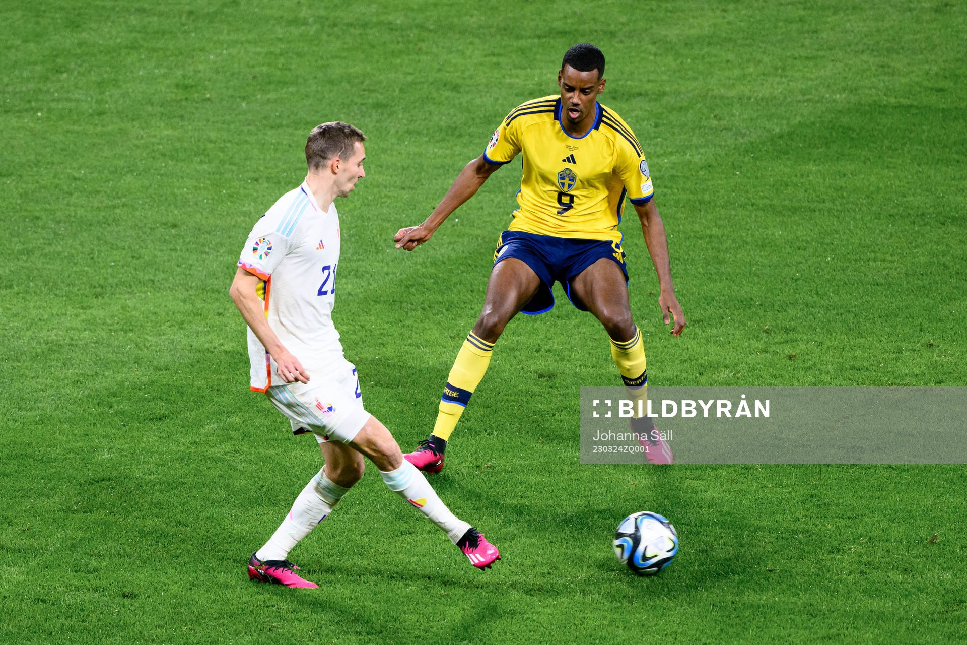 Timothy Castagne of Belgium and Alexander Isak of Sweden