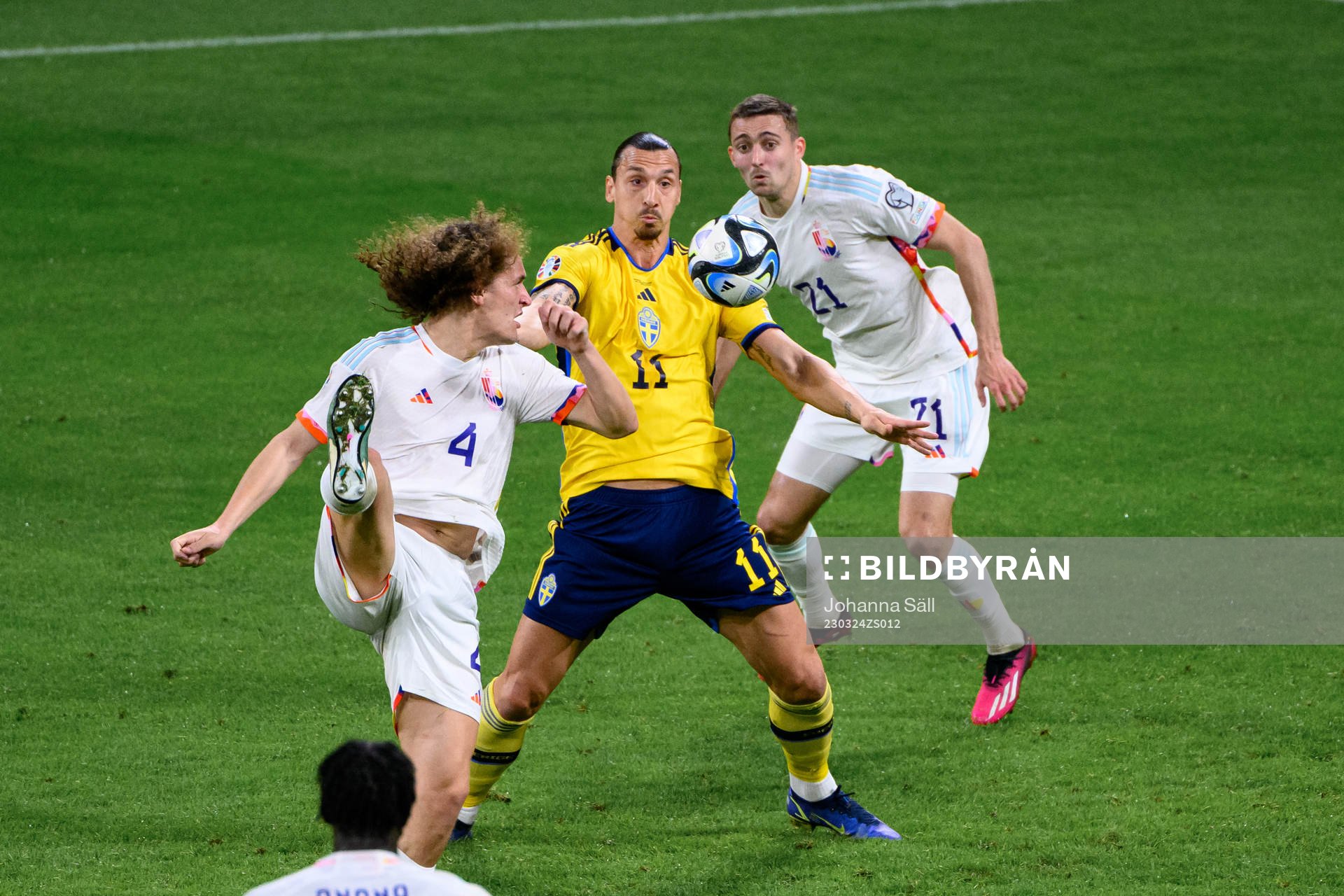 Wout Faes and Timothy Castagne of Belgium against Zlatan
