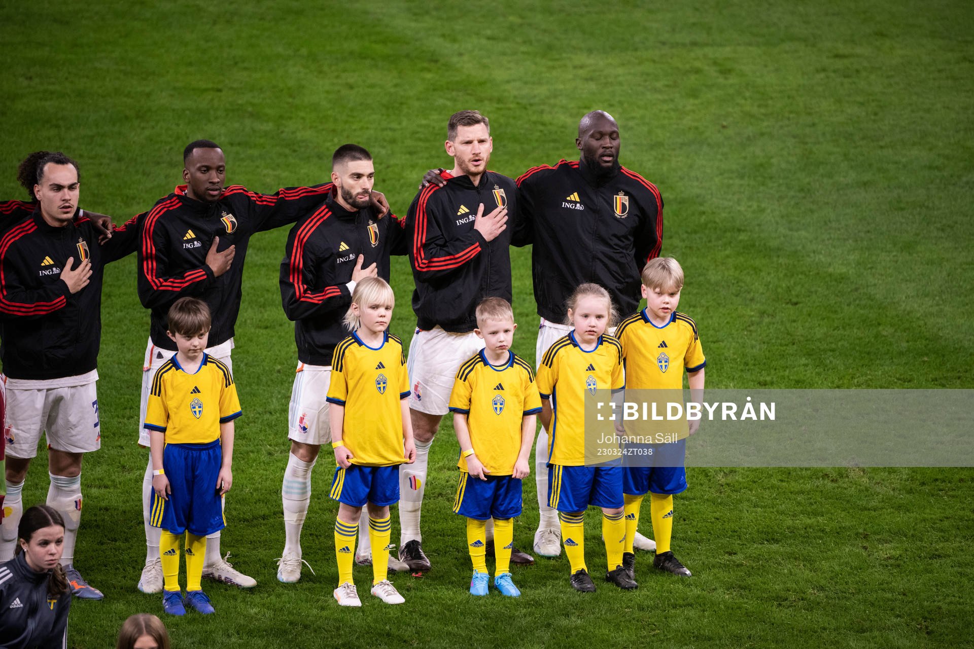 Players of Belgium with mascots