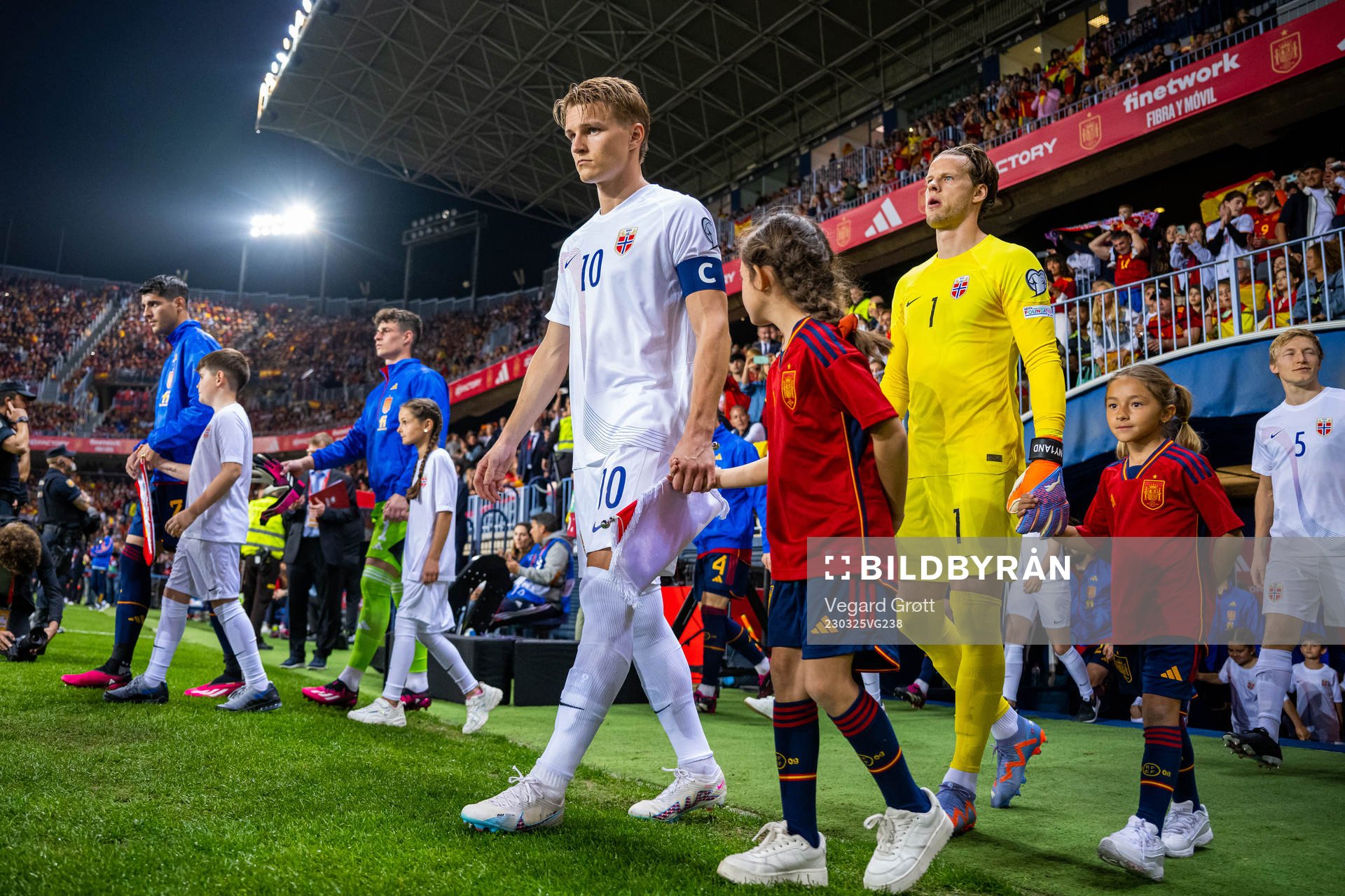 Martin Ødegaard and goalkeeper Ørjan Håskjold Nyland of