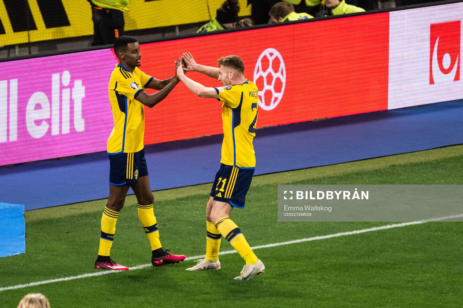 Alexander Isak and Dejan Kulusevski of Sweden celebrate