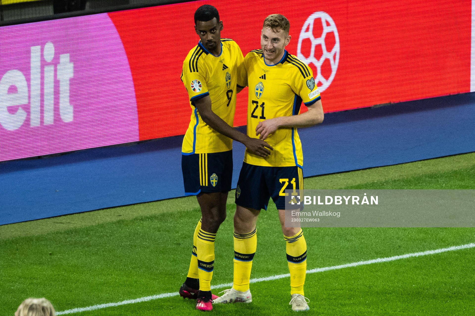 Alexander Isak and Dejan Kulusevski of Sweden celebrate