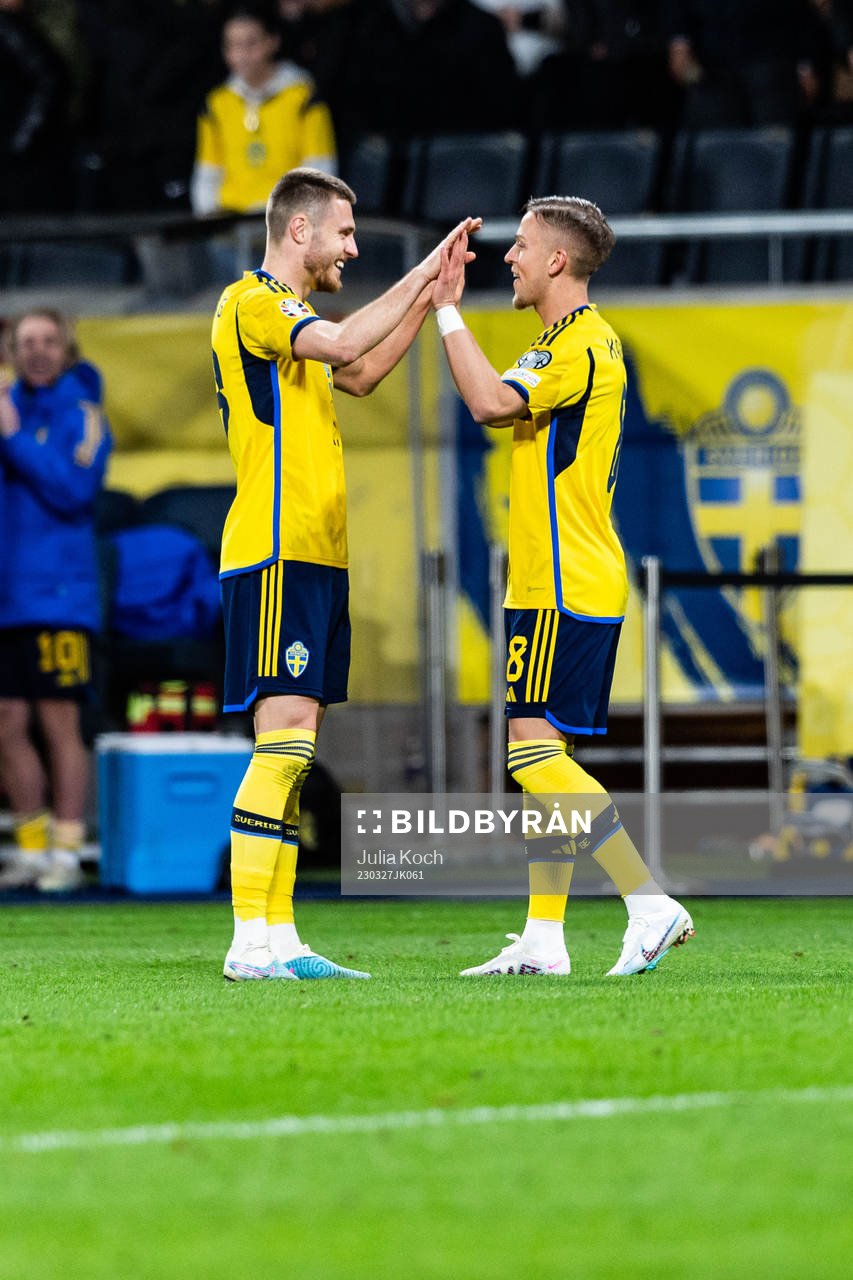 Mattias Svanberg and Jesper Karlsson of Sweden celebrates