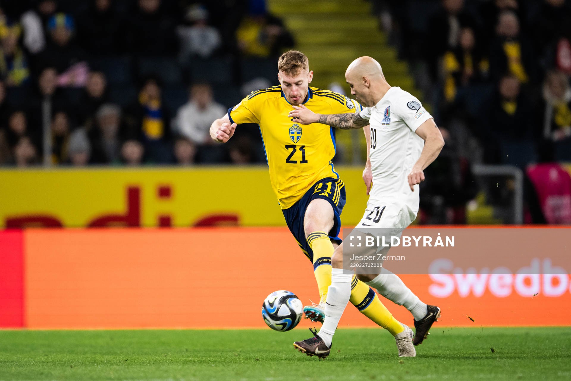 Dejan Kulusevski of Sweden and Richard Almeida of Azerbaijan