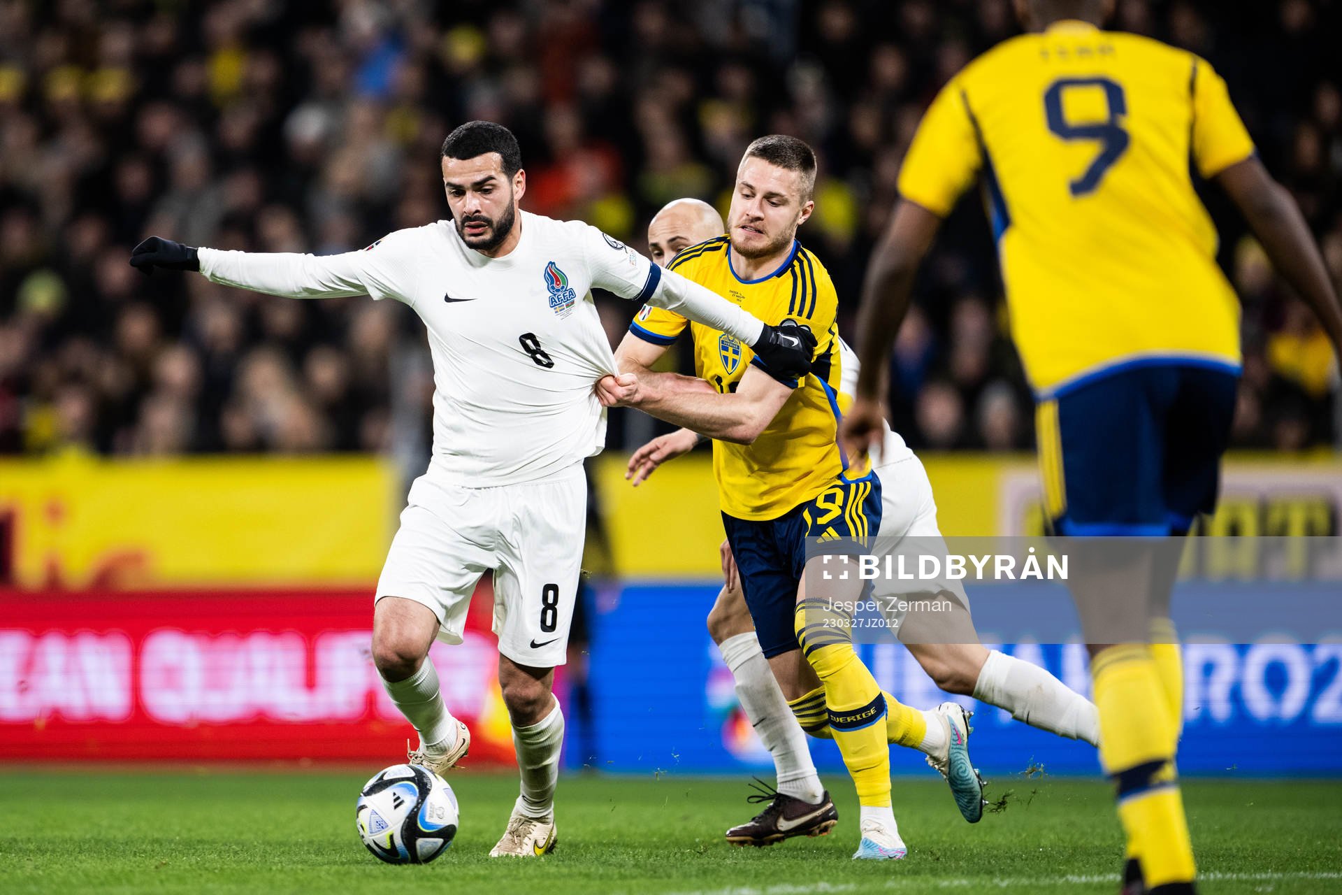 Emin Mahmudov of Azerbaijan and Mattias Svanberg of Sweden during the UEFA Euro Qualifier football match between Sweden and Azerbaijan on March 27, 2023 in Stockholm.