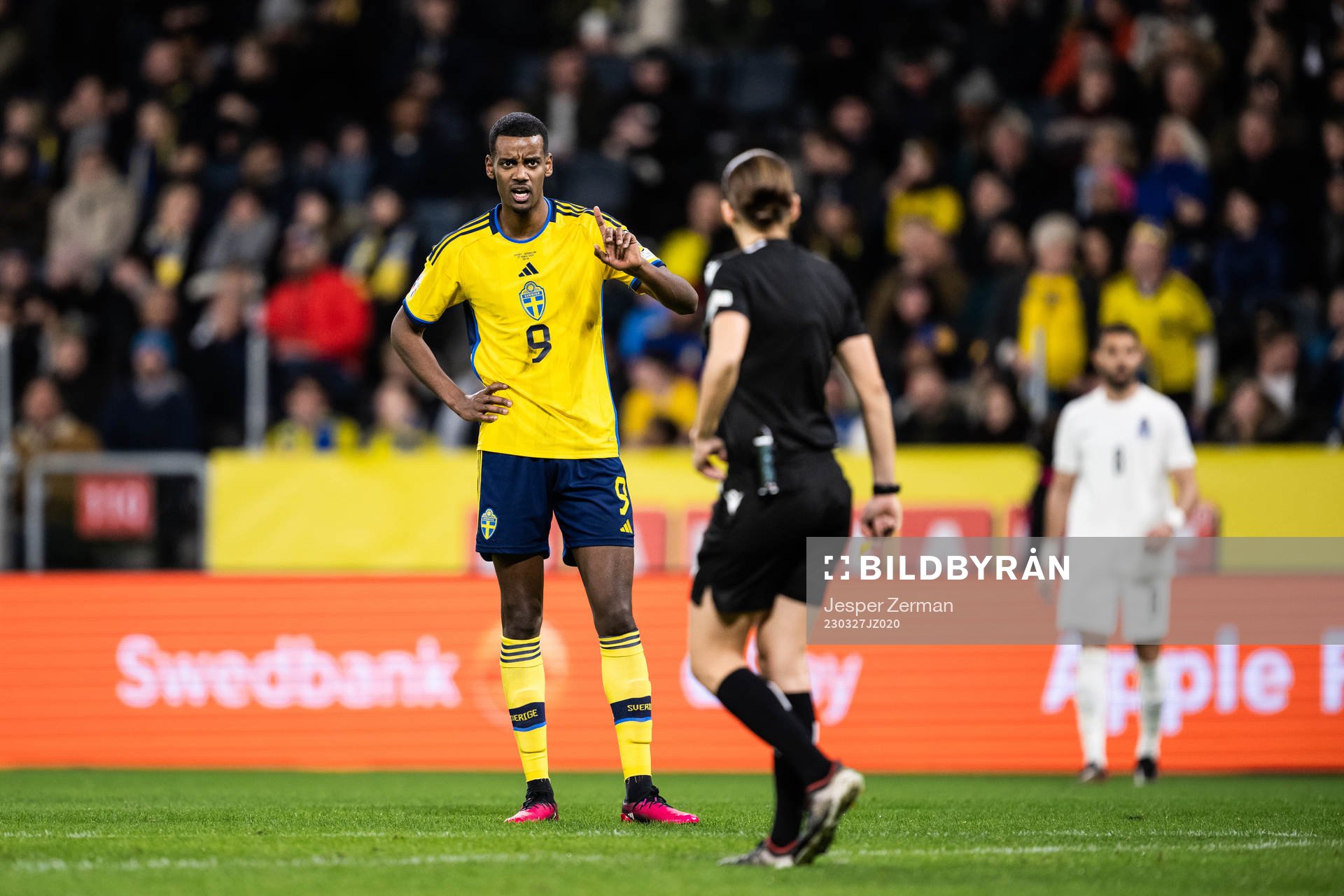 Alexander Isak of Sweden reacts to Referee Stéphanie