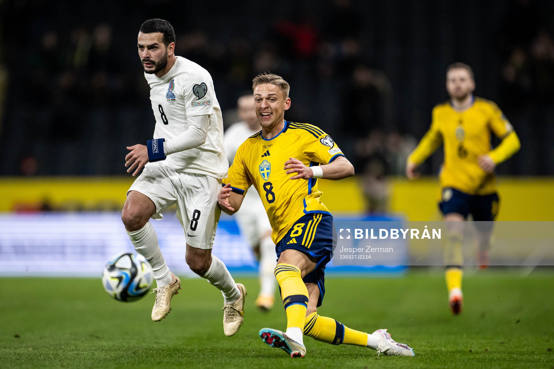 Emin Mahmudov of Azerbaijan and Jesper Karlsson of Sweden during the UEFA Euro Qualifier football match between Sweden and Azerbaijan on March 27, 2023 in Stockholm.