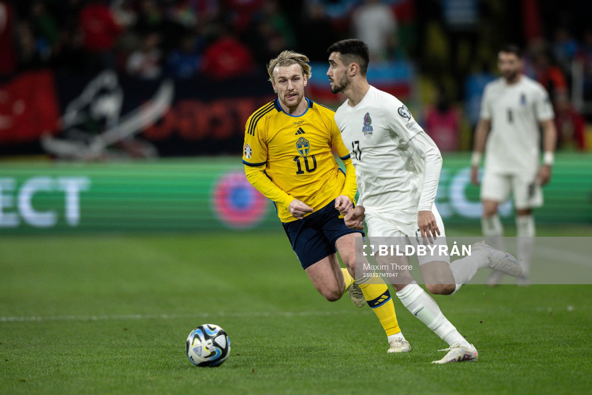 Emil Forsberg of Sweden and Toral Bayramov of Azerbaijan