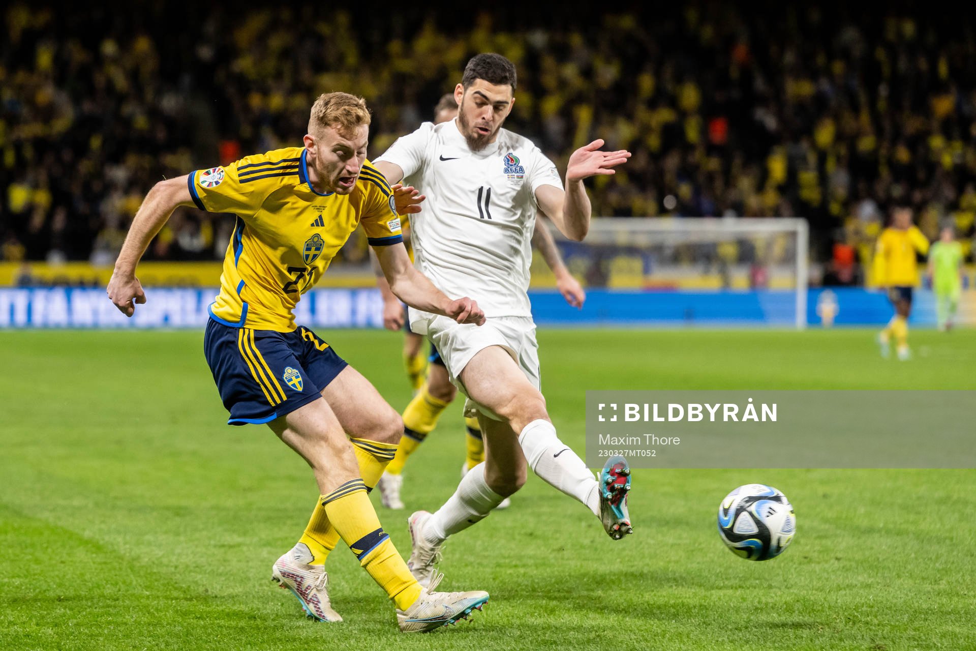 Dejan Kulusevski of Sweden and Ramil Sheydayev of Azerbaijan