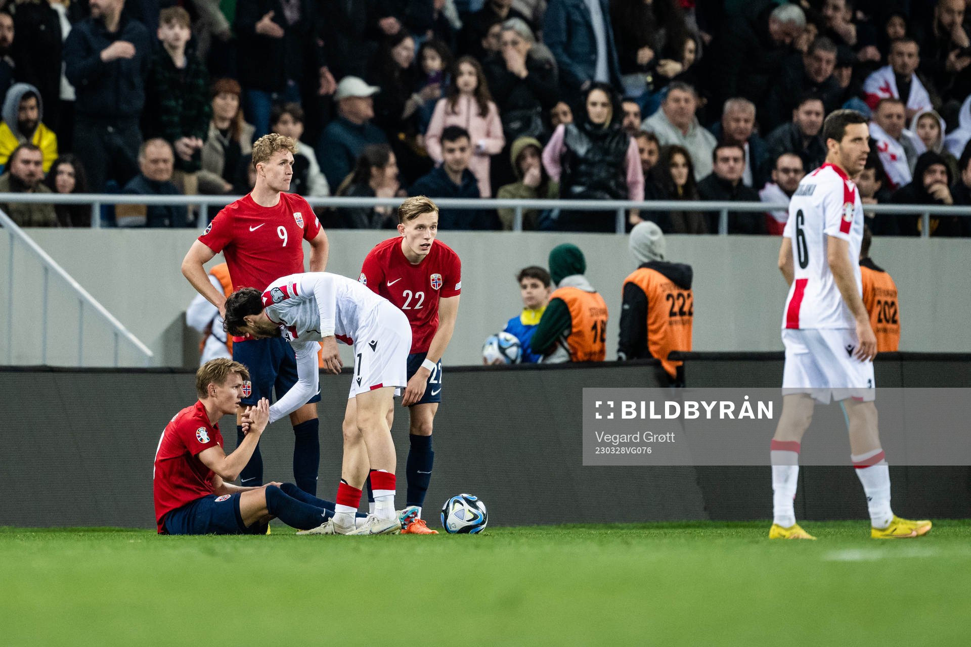 Martin Ødegaard of Norway and Khvicha Kvaratskhelia of