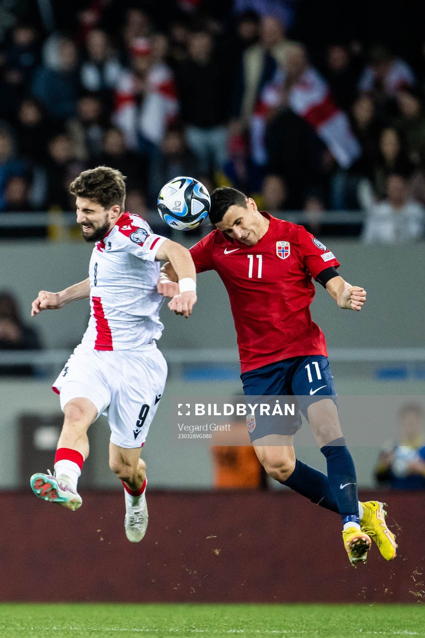 Budu Zivzivadze of Georgia and Mohamed Elyounoussi of Norway during the UEFA Euro Qualifier football match between Georgia and Norway on March 28, 2023 in Batumi. 