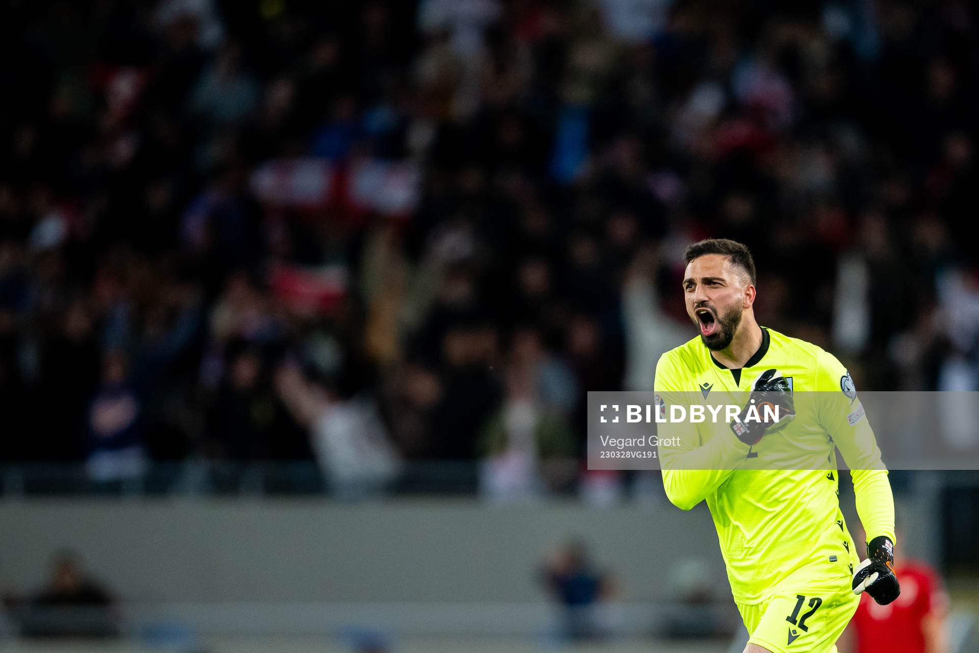 Goalkeeper Giorgi Mamardashvili of Georgia celebrates after 1-1 during the UEFA Euro Qualifier football match between Georgia and Norway on March 28, 2023 in Batumi.