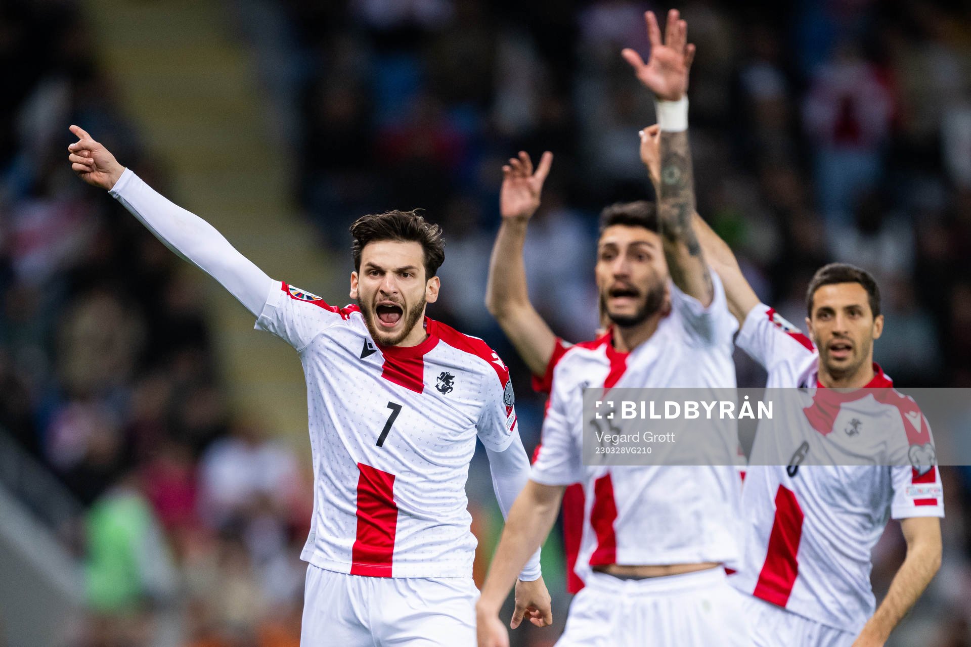 Khvicha Kvaratskhelia and players of Georgia react during the UEFA Euro Qualifier football match between Georgia and Norway on March 28, 2023 in Batumi.