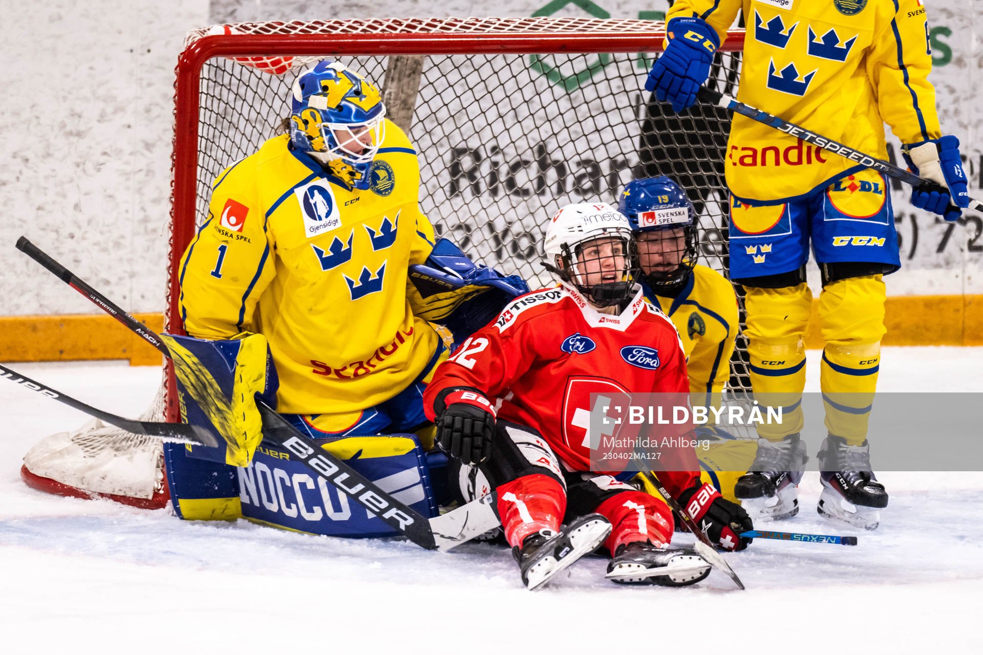 Goaltender Sara Grahn and Sara Hjalmarsson of Sweden and