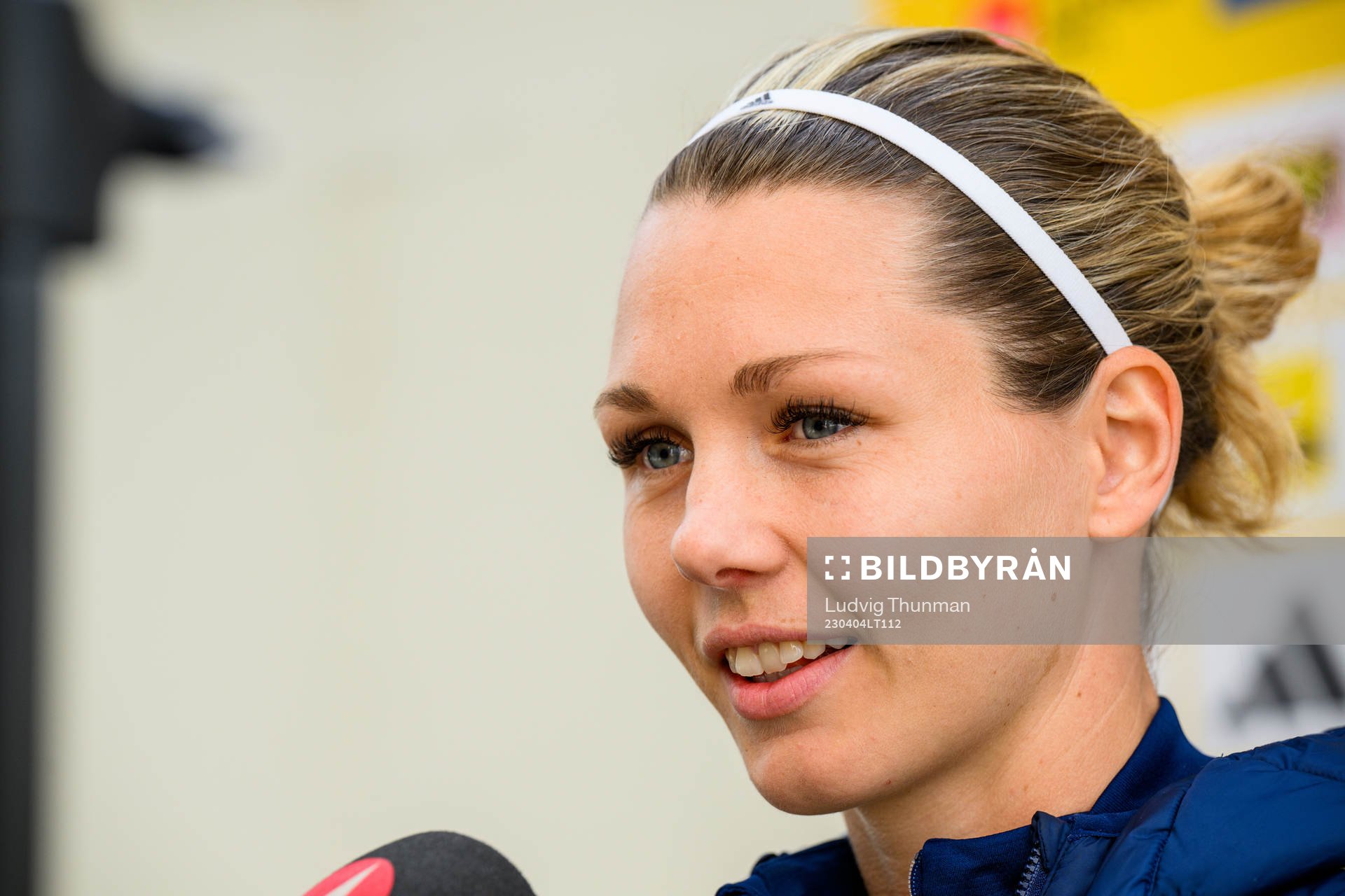 Goalkeeper Jennifer Falk is interviewed by the media