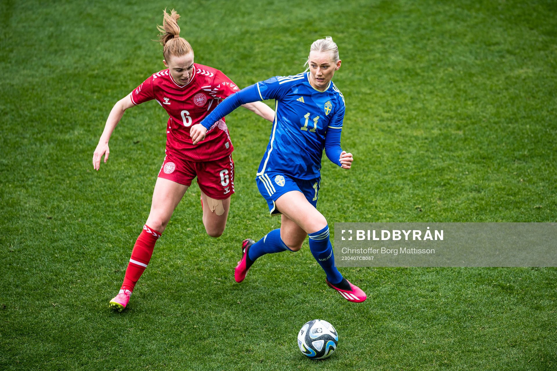 Karen Holmgaard of Denmark and Stina Blackstenius of Sweden