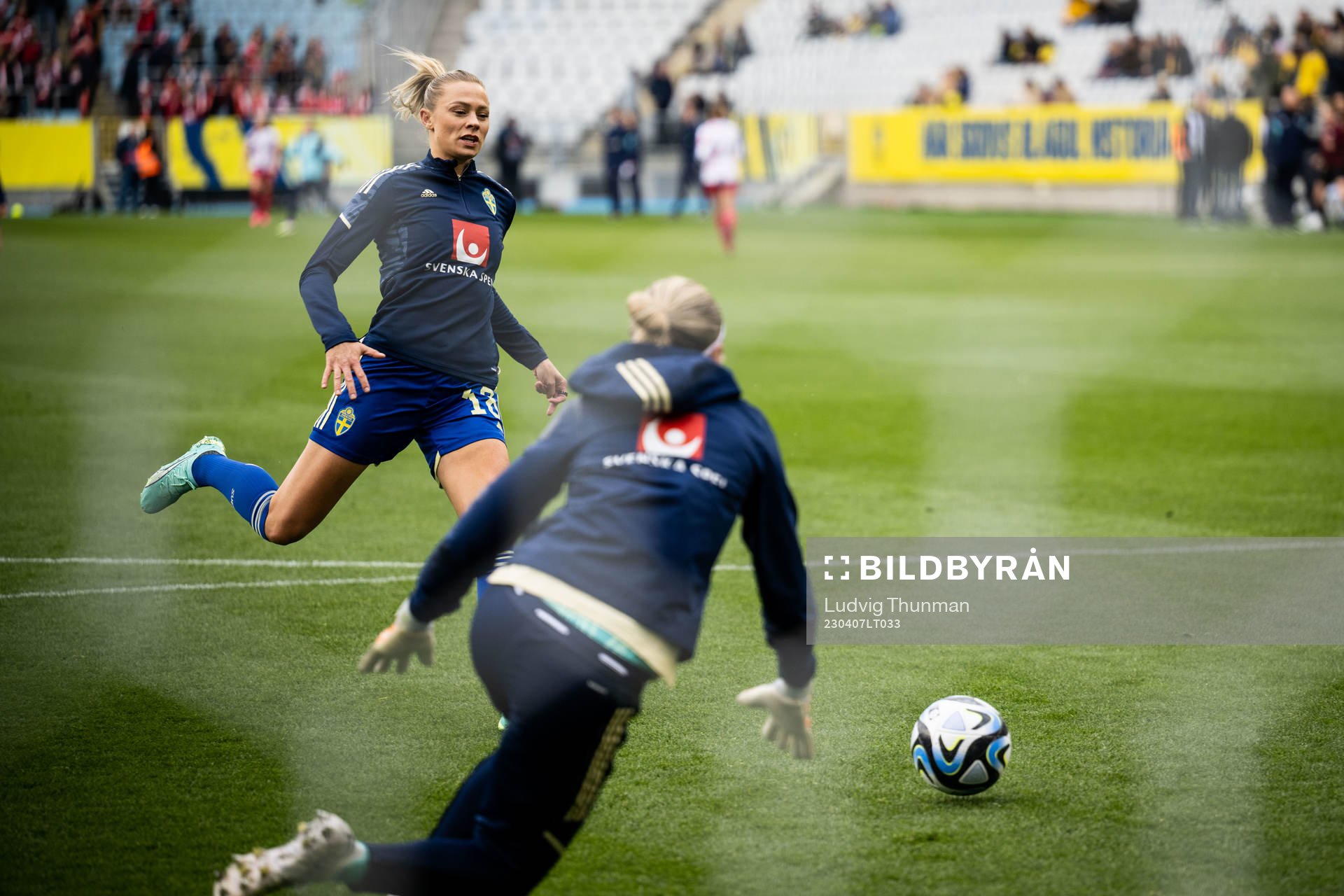 Fridolina Rolfö and goalkeeper Jennifer Falk of Sweden