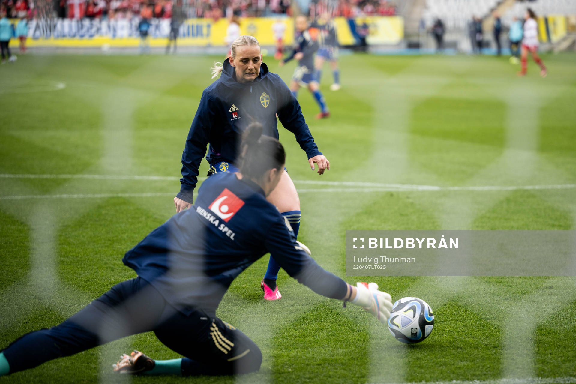 Stina Blackstenius and goalkeeper Zecira Musovic of Sweden