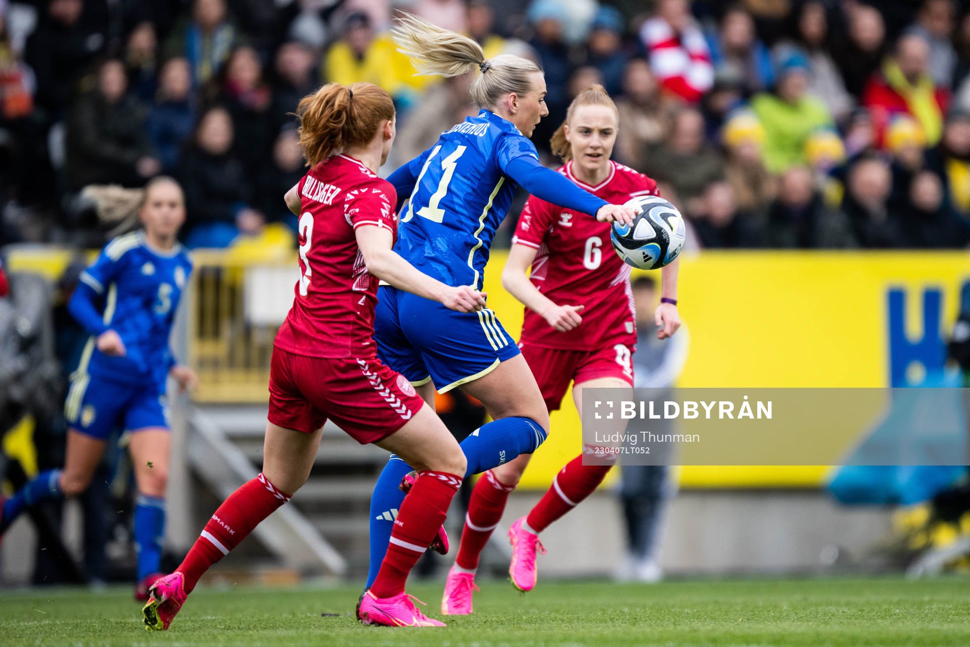 Stina Blackstenius of Sweden against Stine Ballisager and