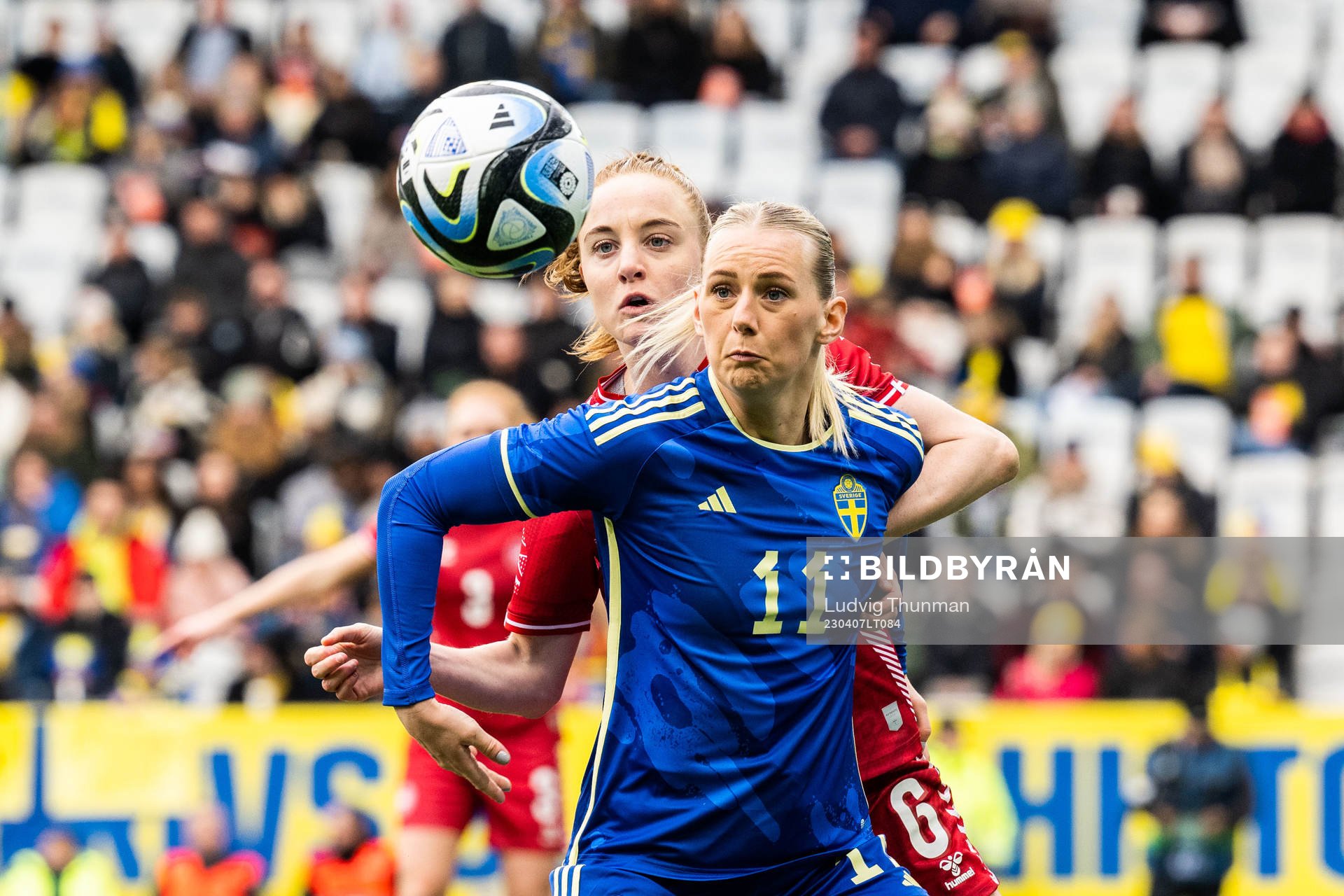 Karen Holmgaard of Denmark and Stina Blackstenius of Sweden
