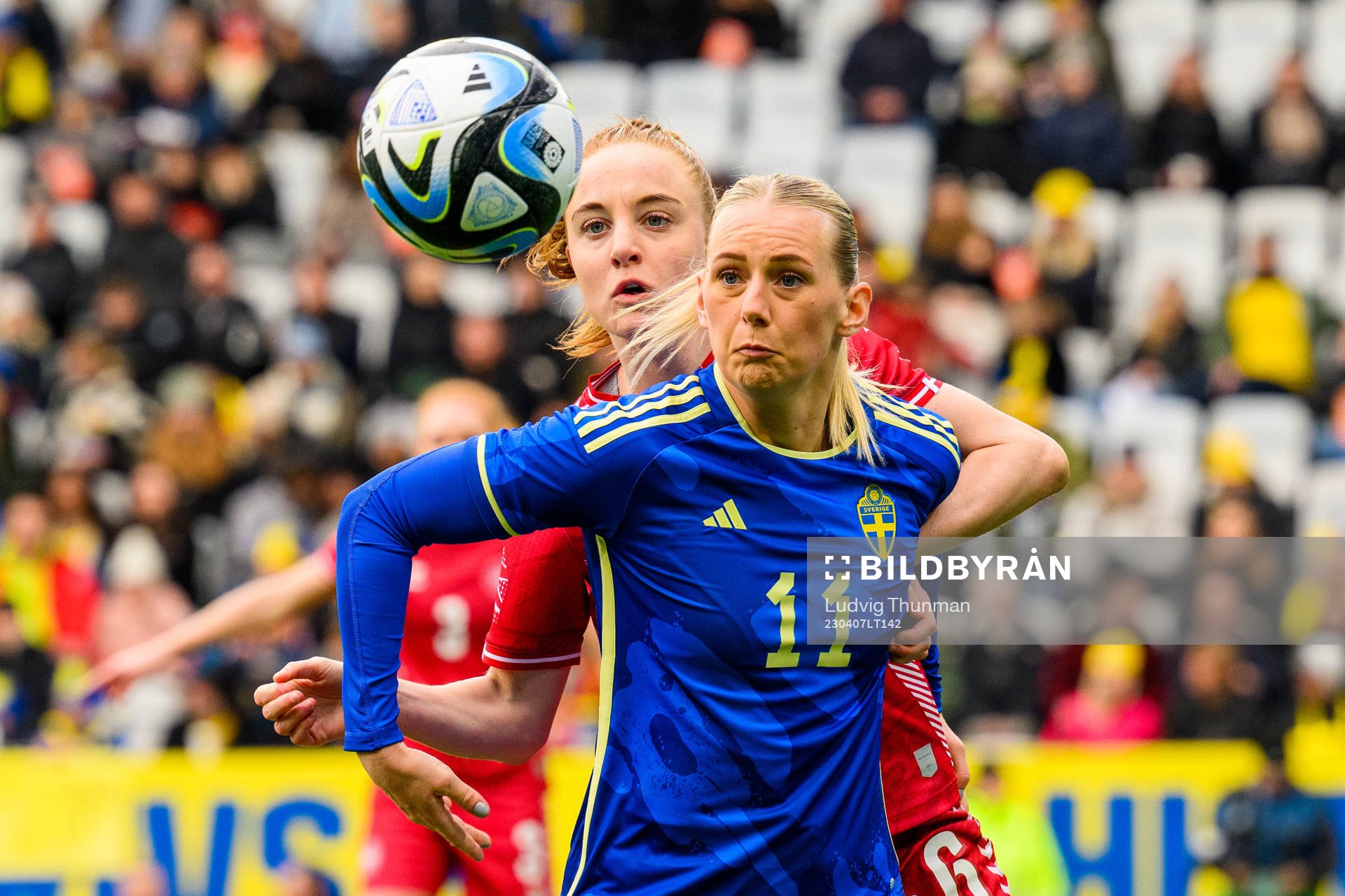 Karen Holmgaard of Denmark and Stina Blackstenius of Sweden