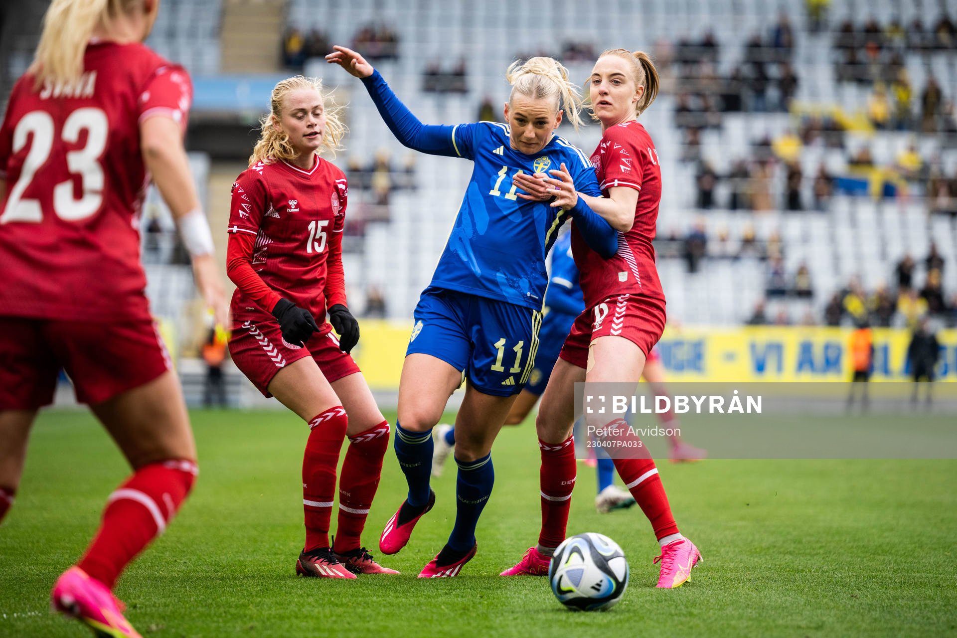Stina Blackstenius of Sweden against Kathrine Kuhl and