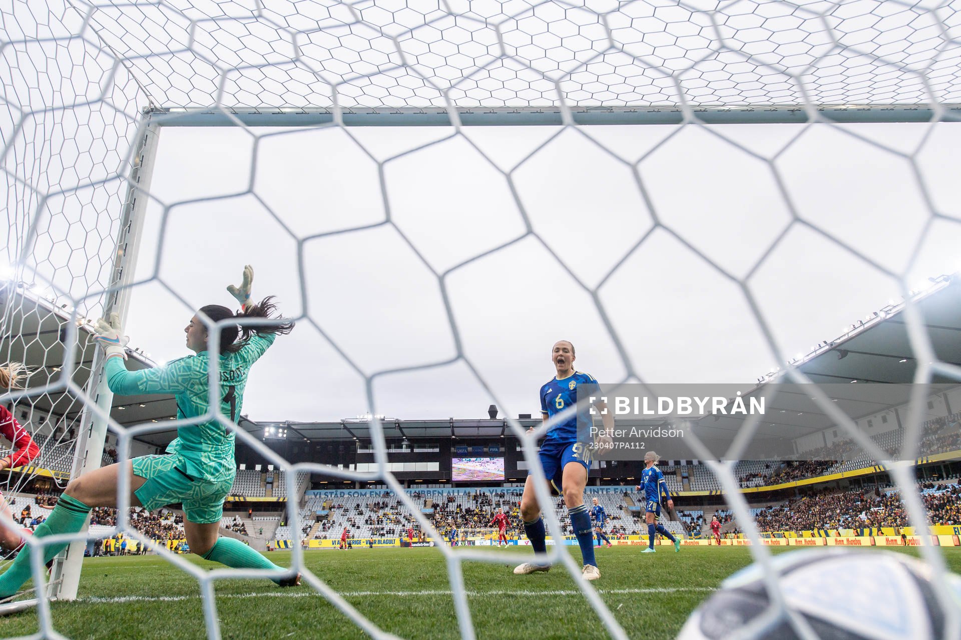 Stine Larsen of Denmark (not pictured) scores the 0-1 goal