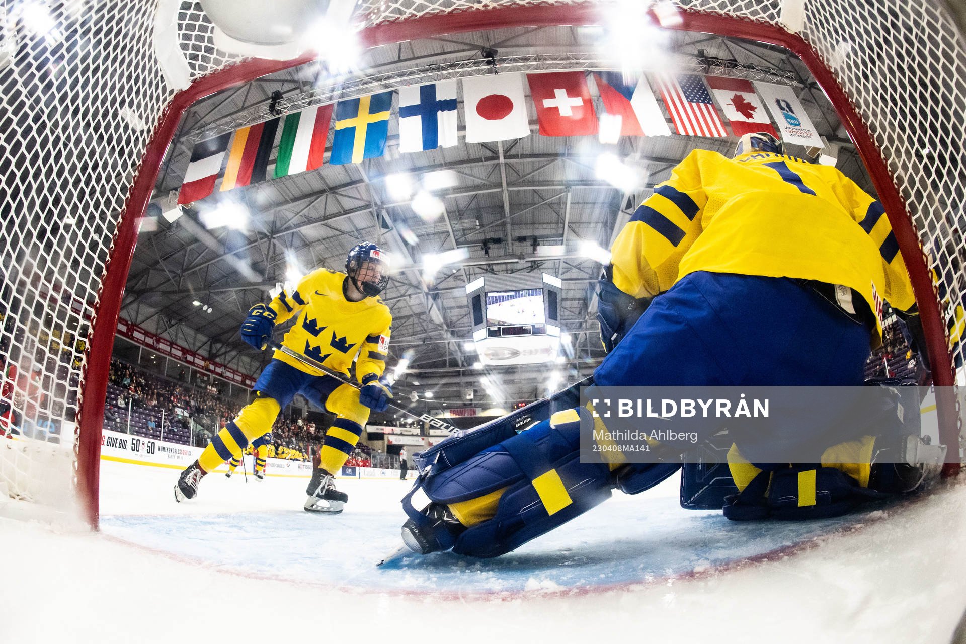 Annie Silén and goaltender Sara Grahn  of Sweden