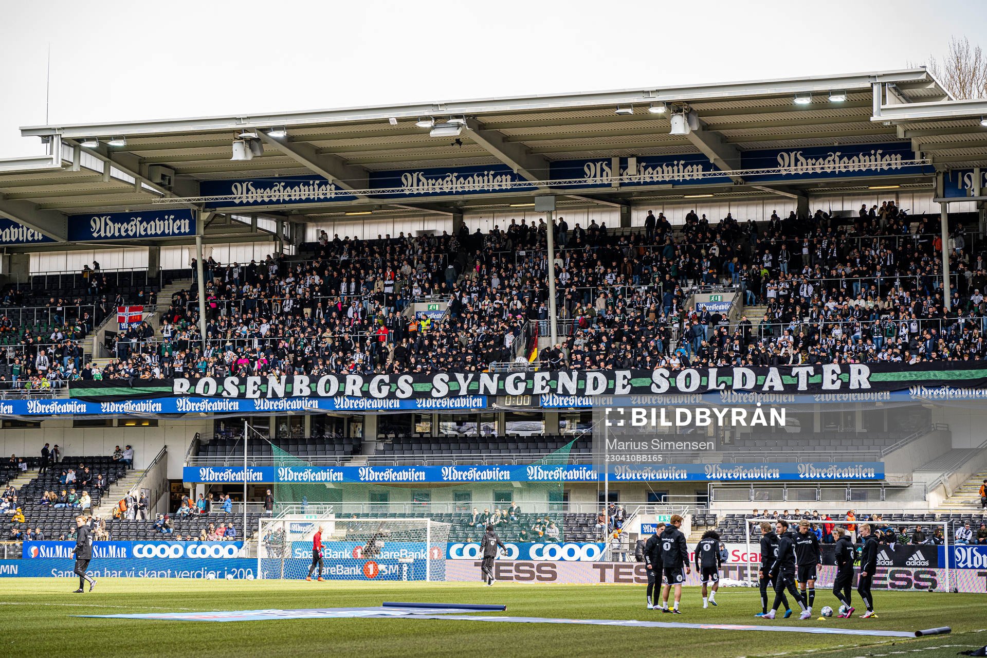 Spectators in the stands at Lerkendal Stadion ahead of the Eliteserien match between Rosenborg and Viking on April 10, 2023 in Trondheim.