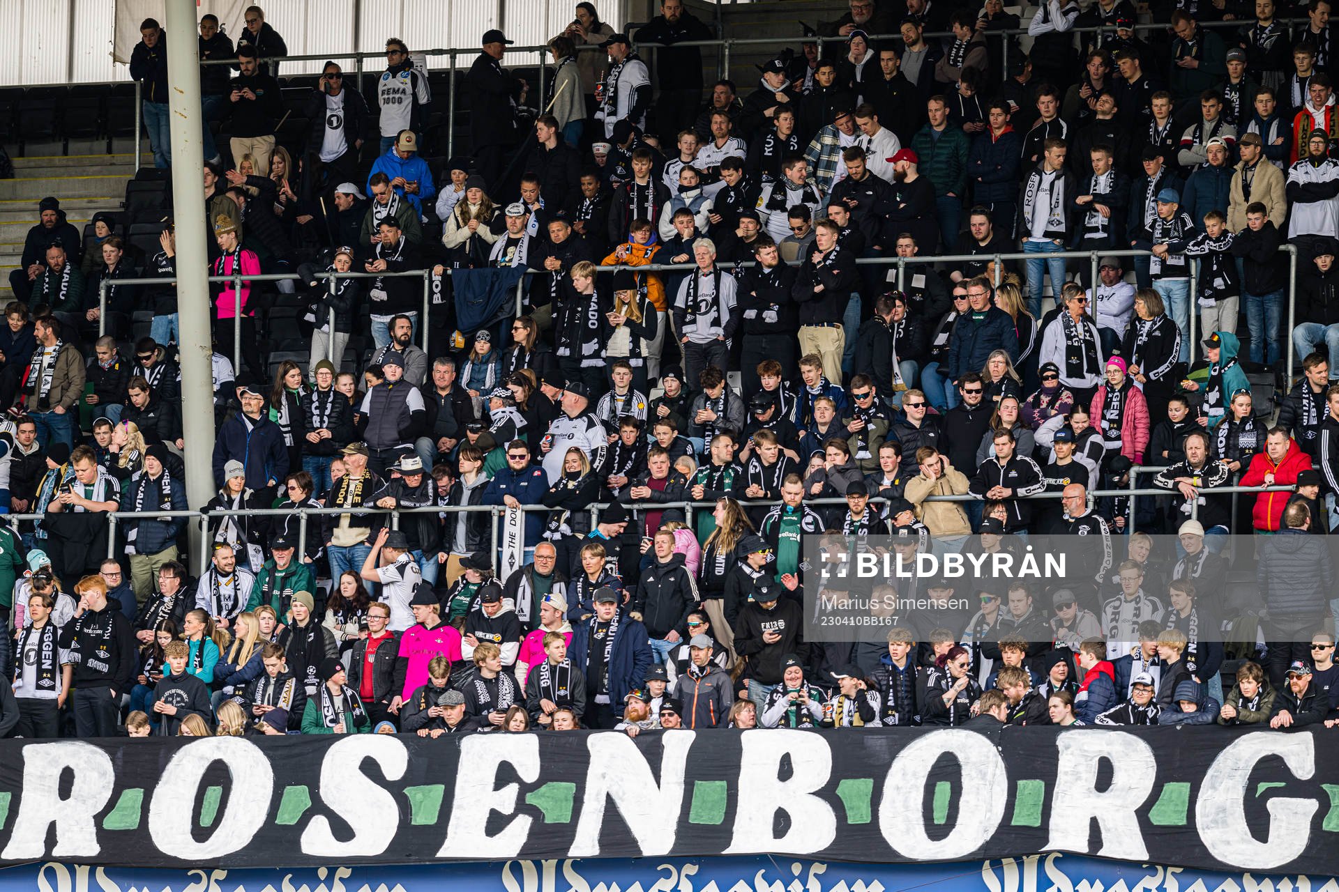 Spectators in the stands at Lerkendal Stadion ahead of the Eliteserien match between Rosenborg and Viking on April 10, 2023 in Trondheim.