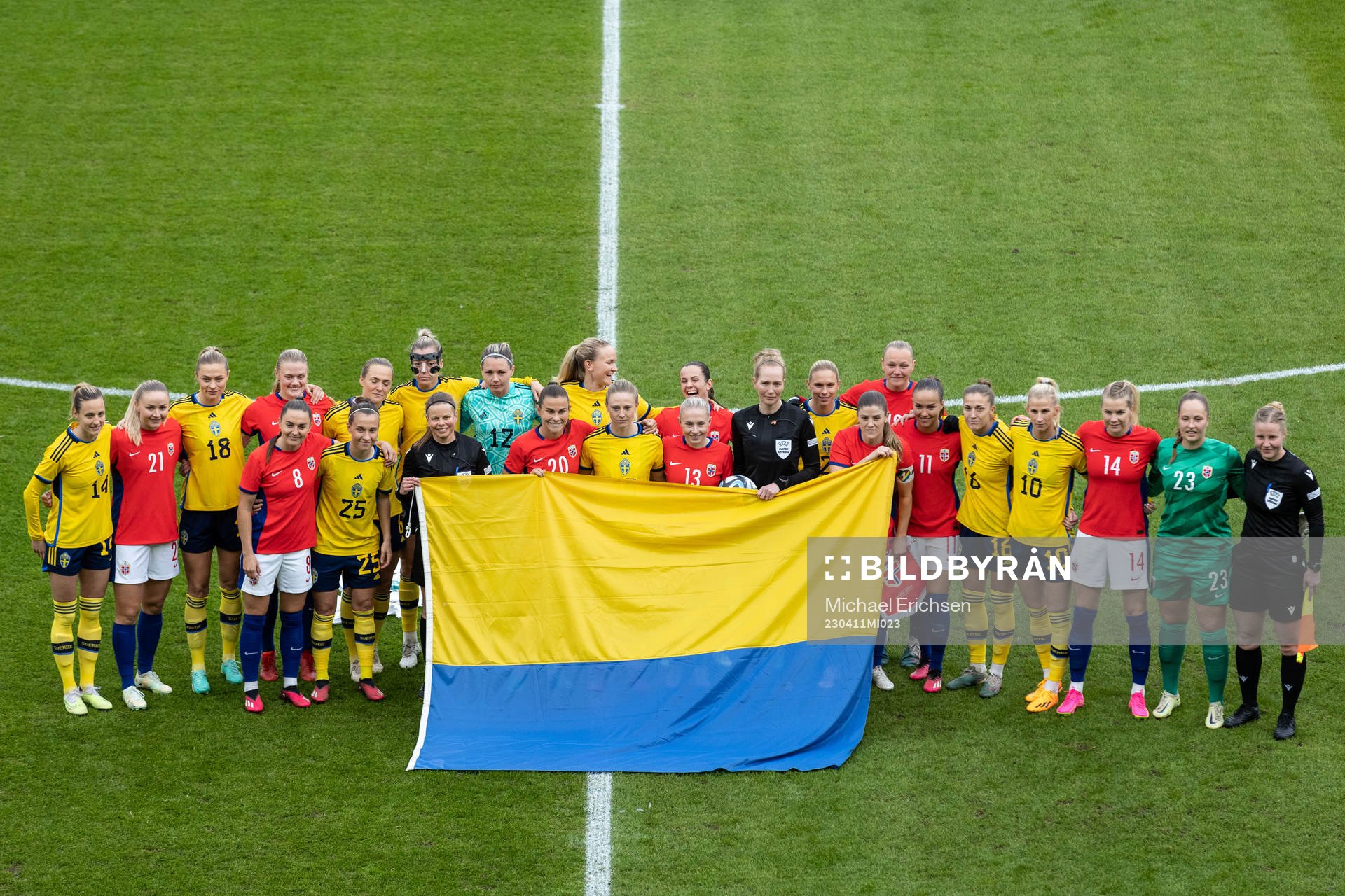 Players of Sweden and of Norway pose for a photo with the