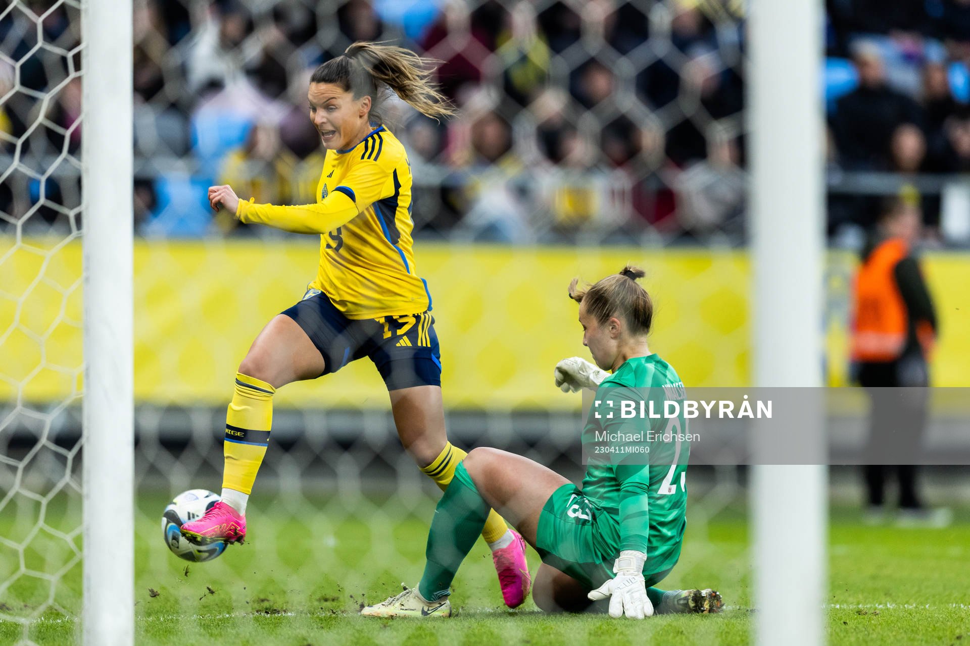 Johanna Rytting Kaneryd of Sweden and goalkeeper Aurora