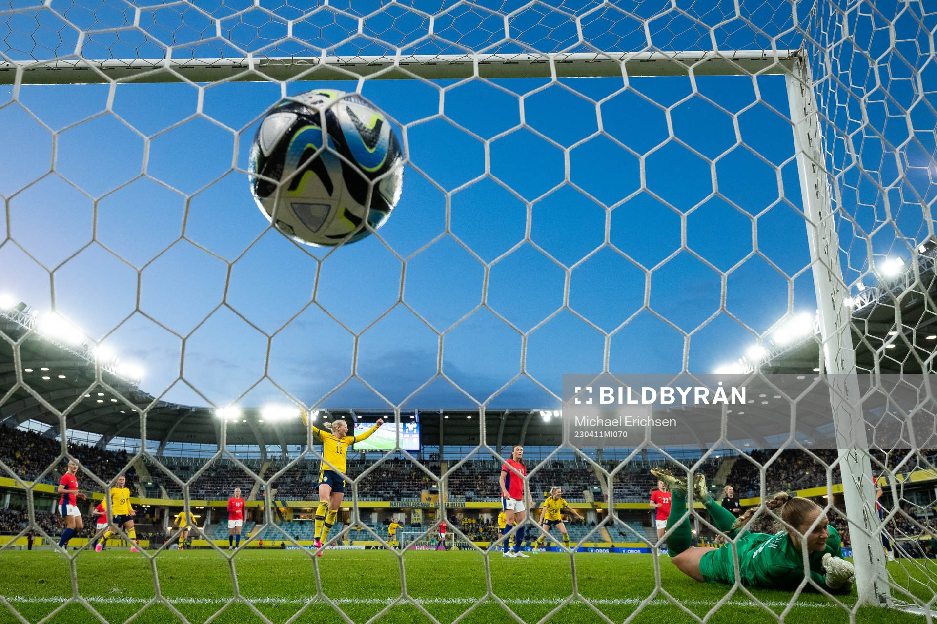 Olivia Schough of Sweden scores 3-2 behind goalkeeper