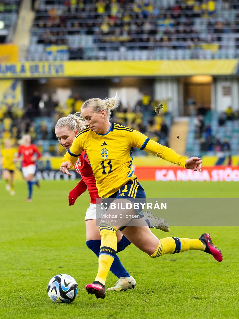 Thea Bjelde of Norway and Stina Blackstenius of Sweden