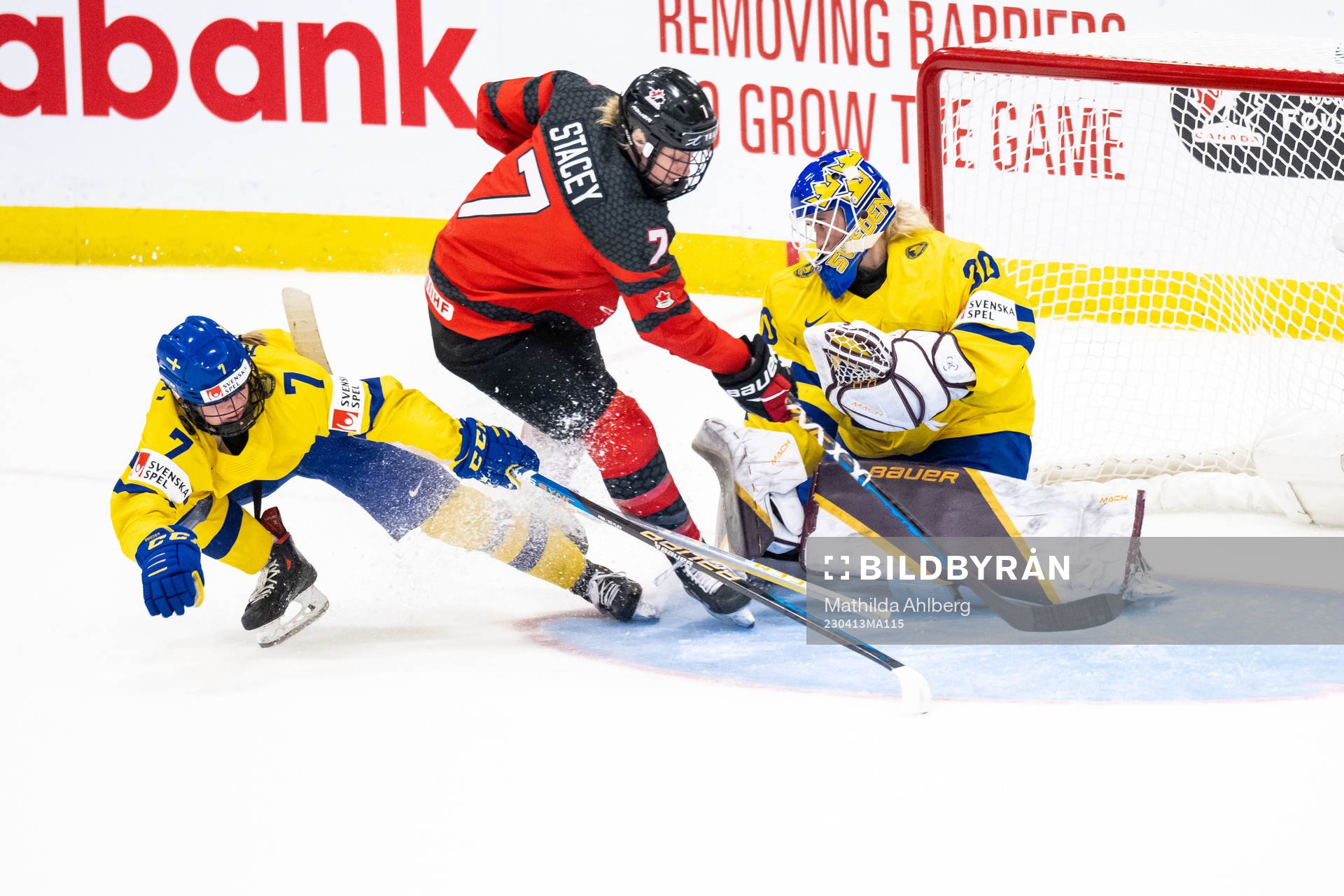 Mira Jungåker and goaltender Emma Söderberg of Sweden and