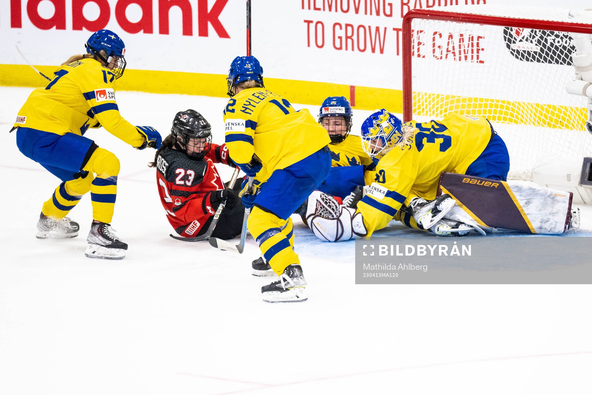 Erin Ambrose of Canada and goaltender Emma Söderberg of